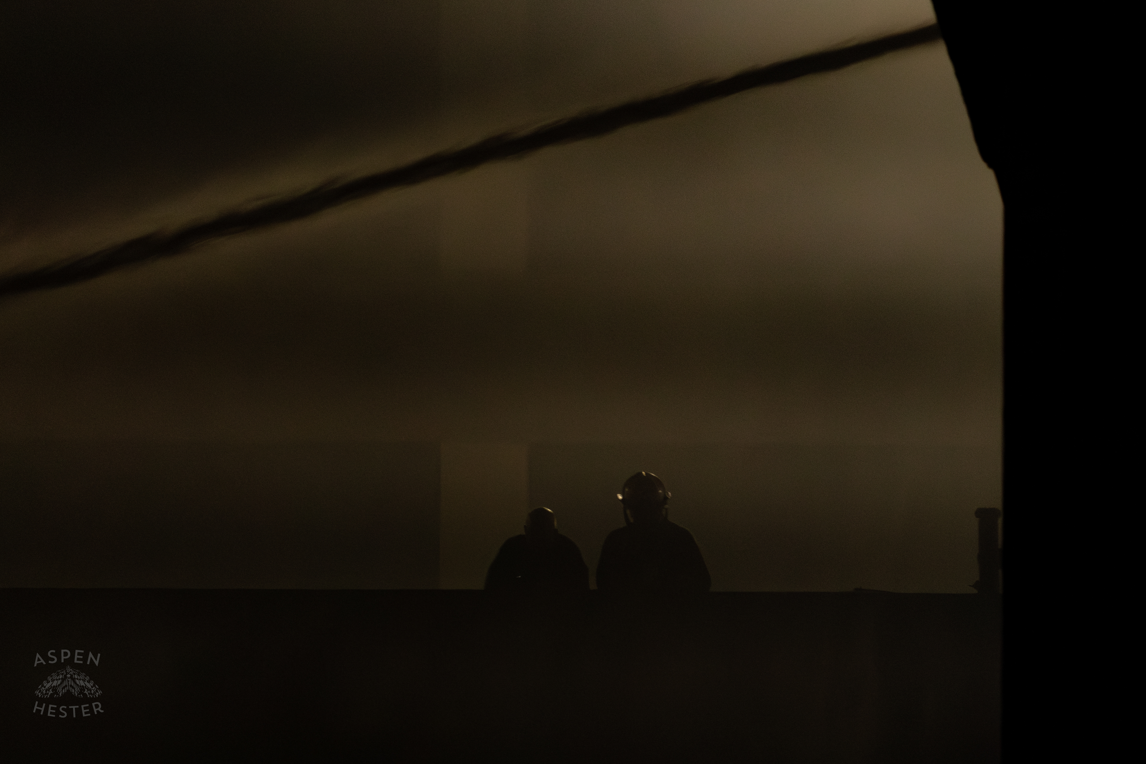 Fire Officials Look on from A Nearby Parking Garage at The Vacant St. Paul's German Evangelical Church as a Massive 3 Alarm Blaze Engulfs it on East Broadway. October 9th, 2024/Aspen Hester