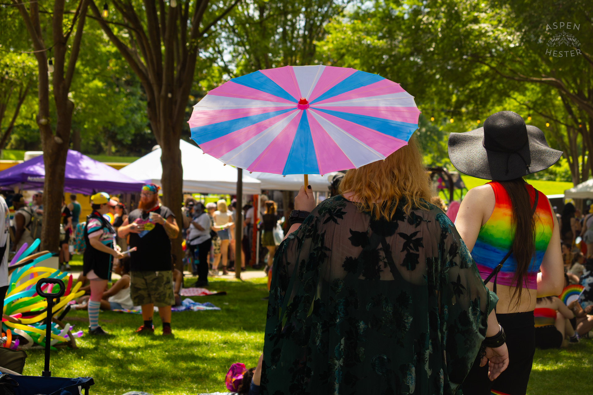 This Year's Popular Accessory, Pride Parasols All Over Kentuckiana Pride 2025. June 21th, 2025/Aspen Hester  