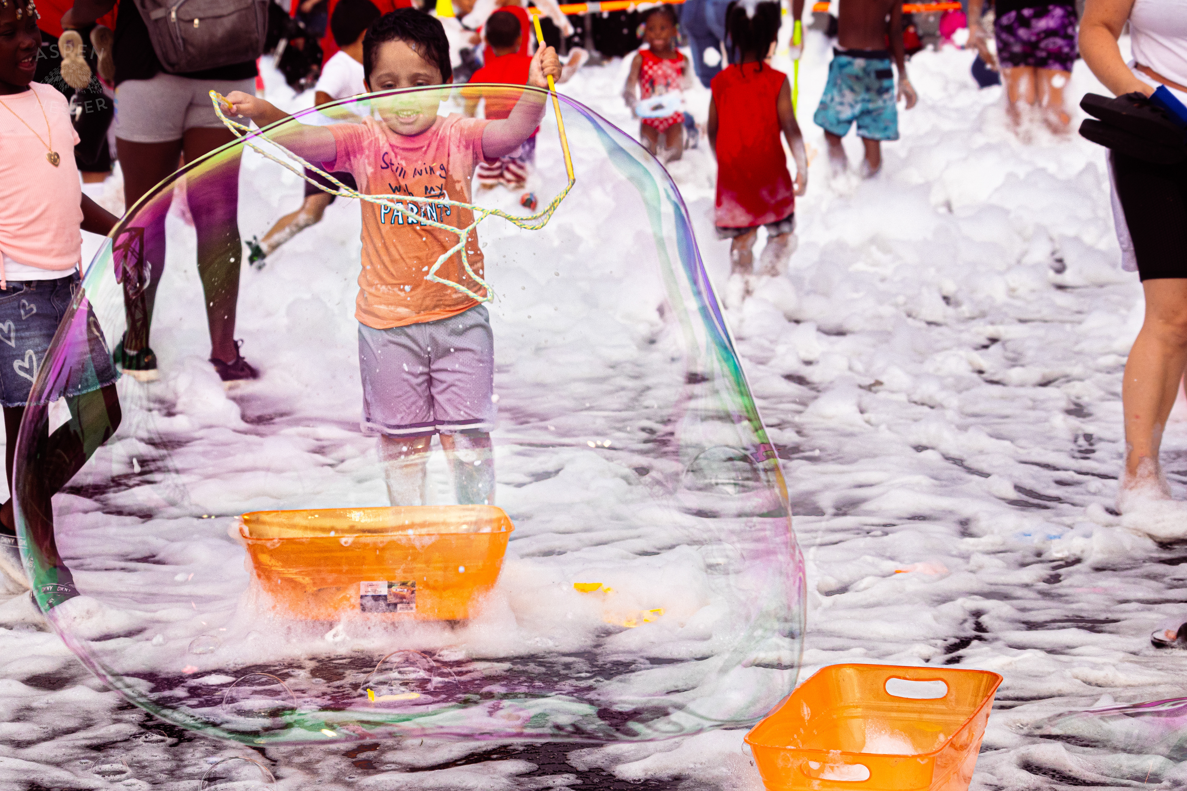 Kid Making Bubbles in the Bubble Party at Waterfront Park Fourth of July. July 4th, 2024/Aspen Hester