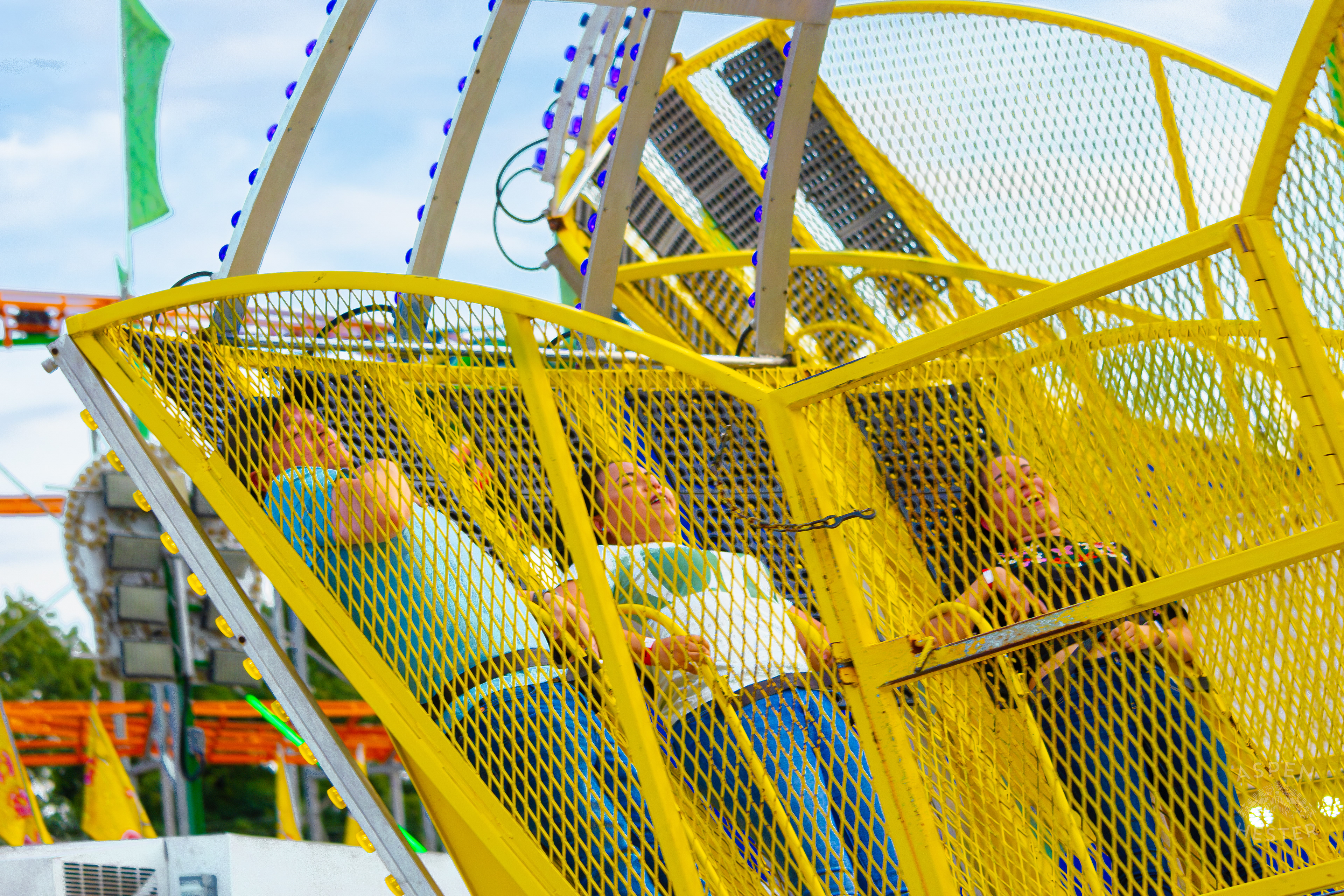 People Spinning Around a Ride at The 120th Kentucky State Fair. July 15th, 2024/Aspen Hester