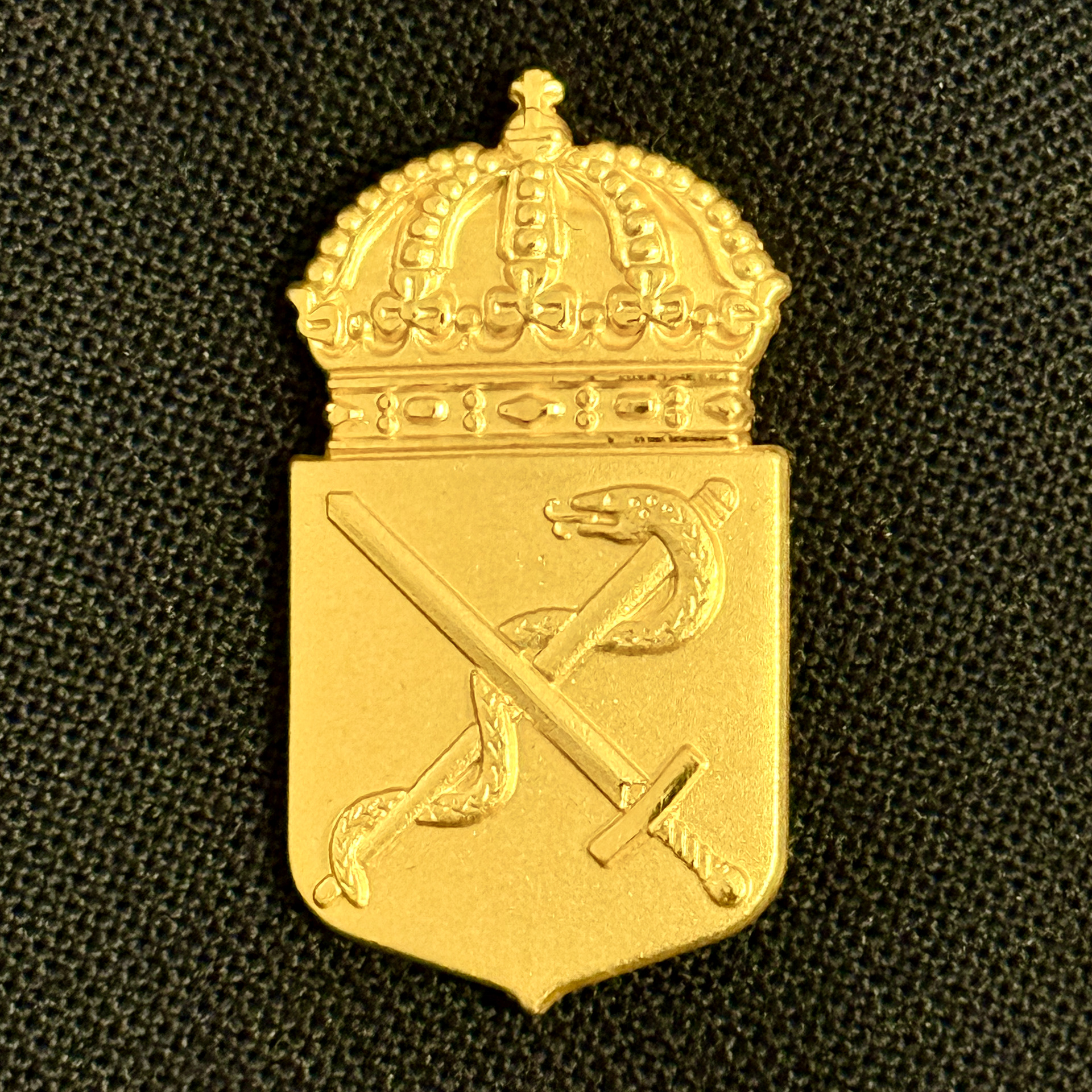 Försvarsmedicincentrums coat of arms