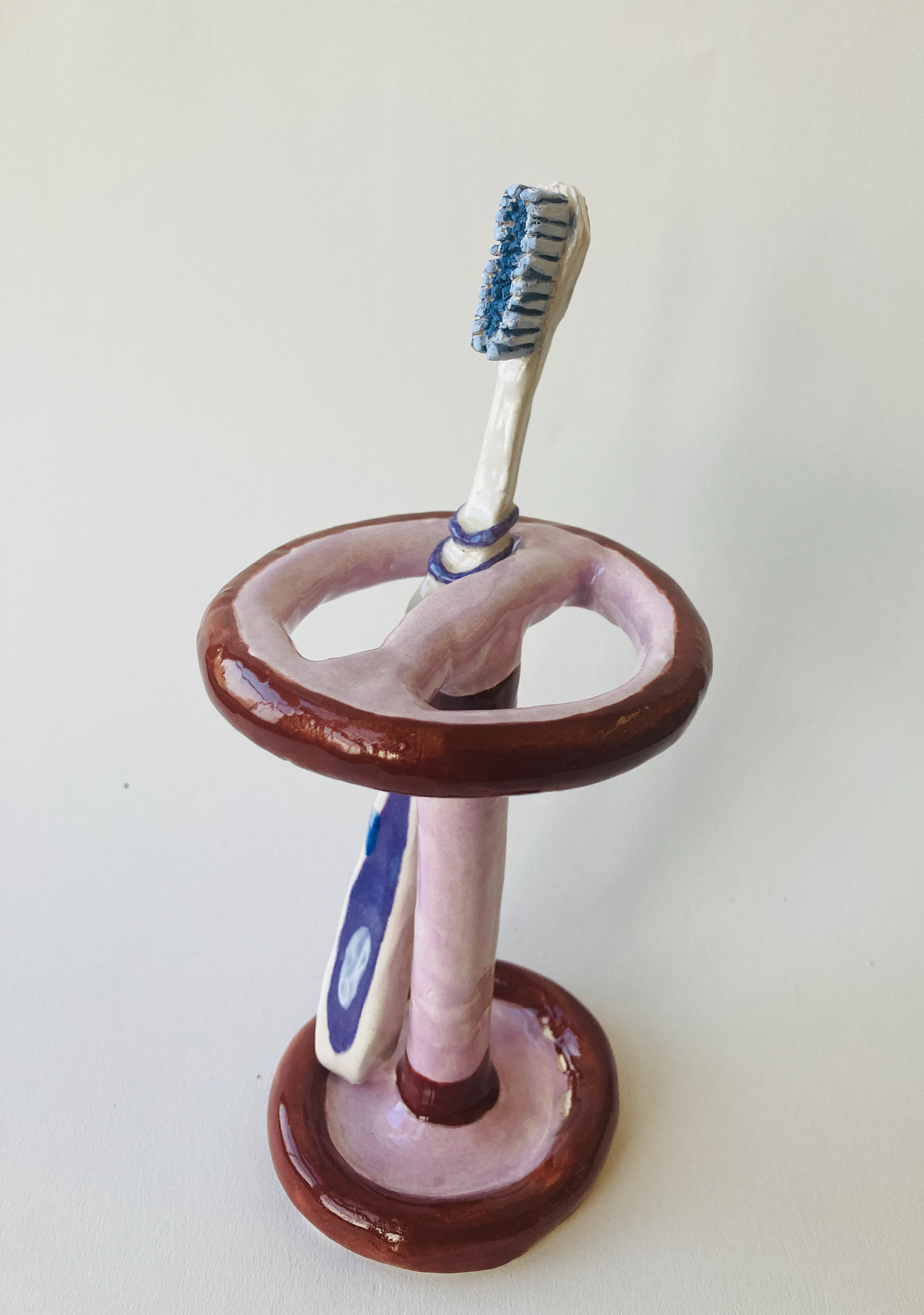 Evan Mansour, Gilmour Academy, Grade 9, TOOTHBRUSH, Ceramics & Glass, Educator: Susan Southard, Honorable Mention