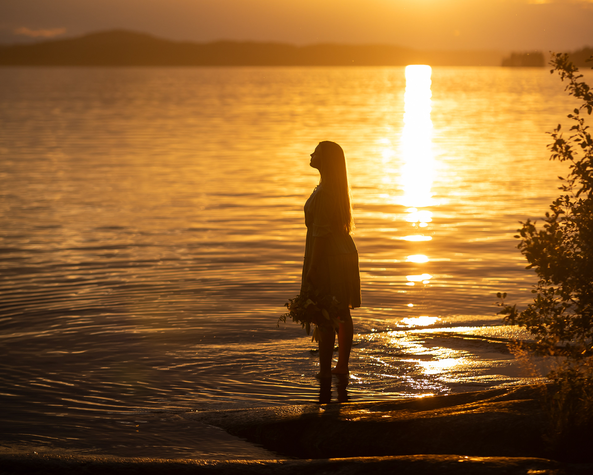 Henkilökuvaus auringonlaskussa