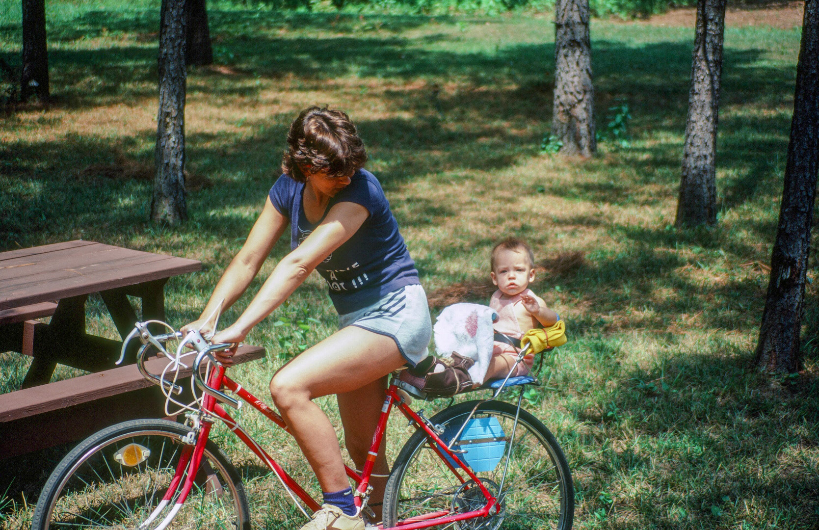 Mom taking Lindsey for a bike ride