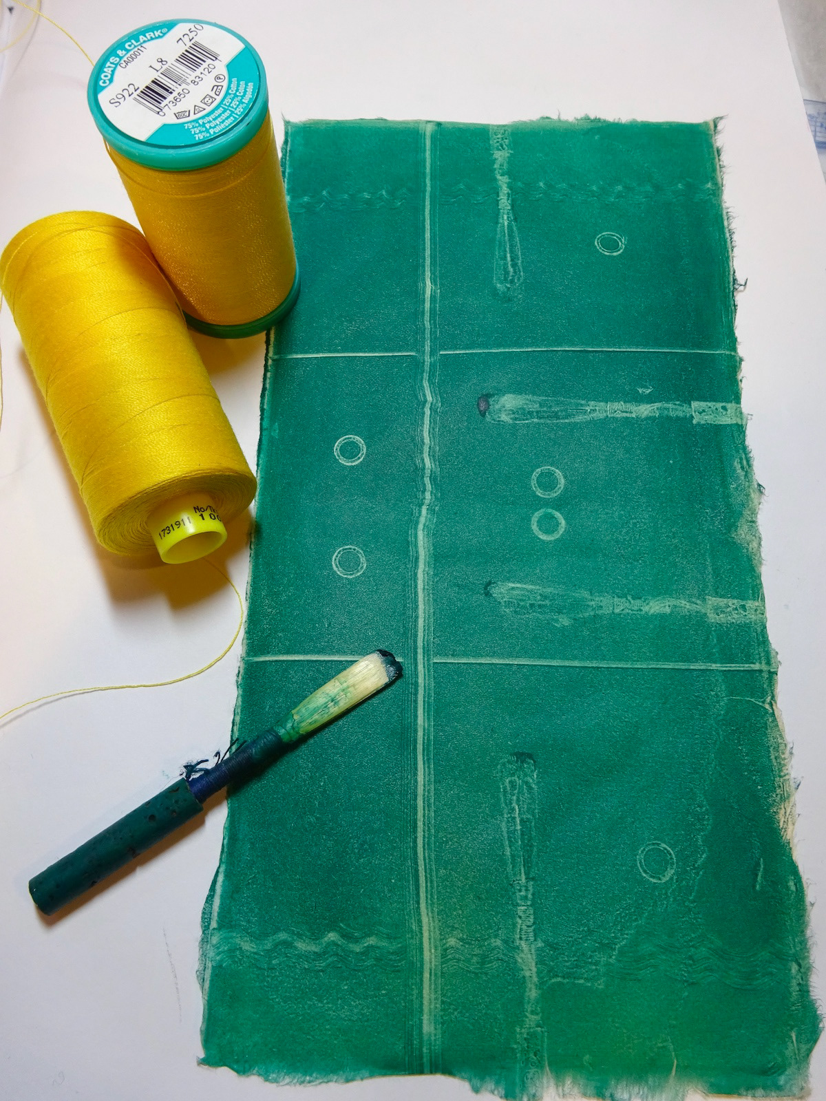 Monotype process, using an old oboe reed to make marks in ink