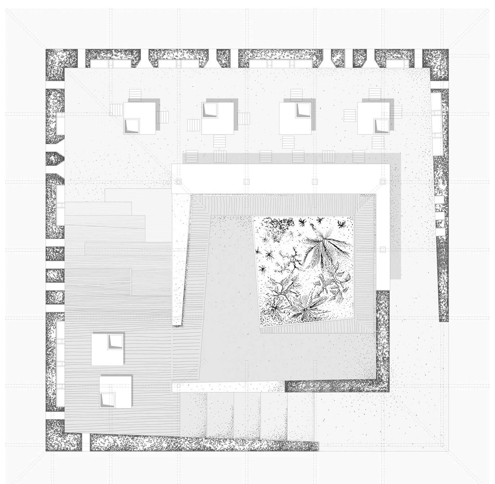 Plan intérieur de la bibliothèque en pisé s'articulant autour d'un patio végétalisé