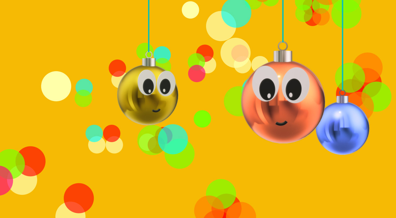 Esferas de árbol de Navidad con expresión afable sobre una base multicolor
