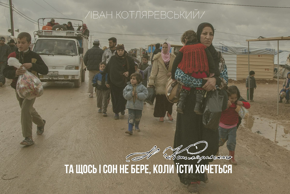 The state coat of arms of Ukraine, Tryzub, against background Dynamivska str barricades on fire. Euromaidan Protests. Events of Jan 19, 2014.