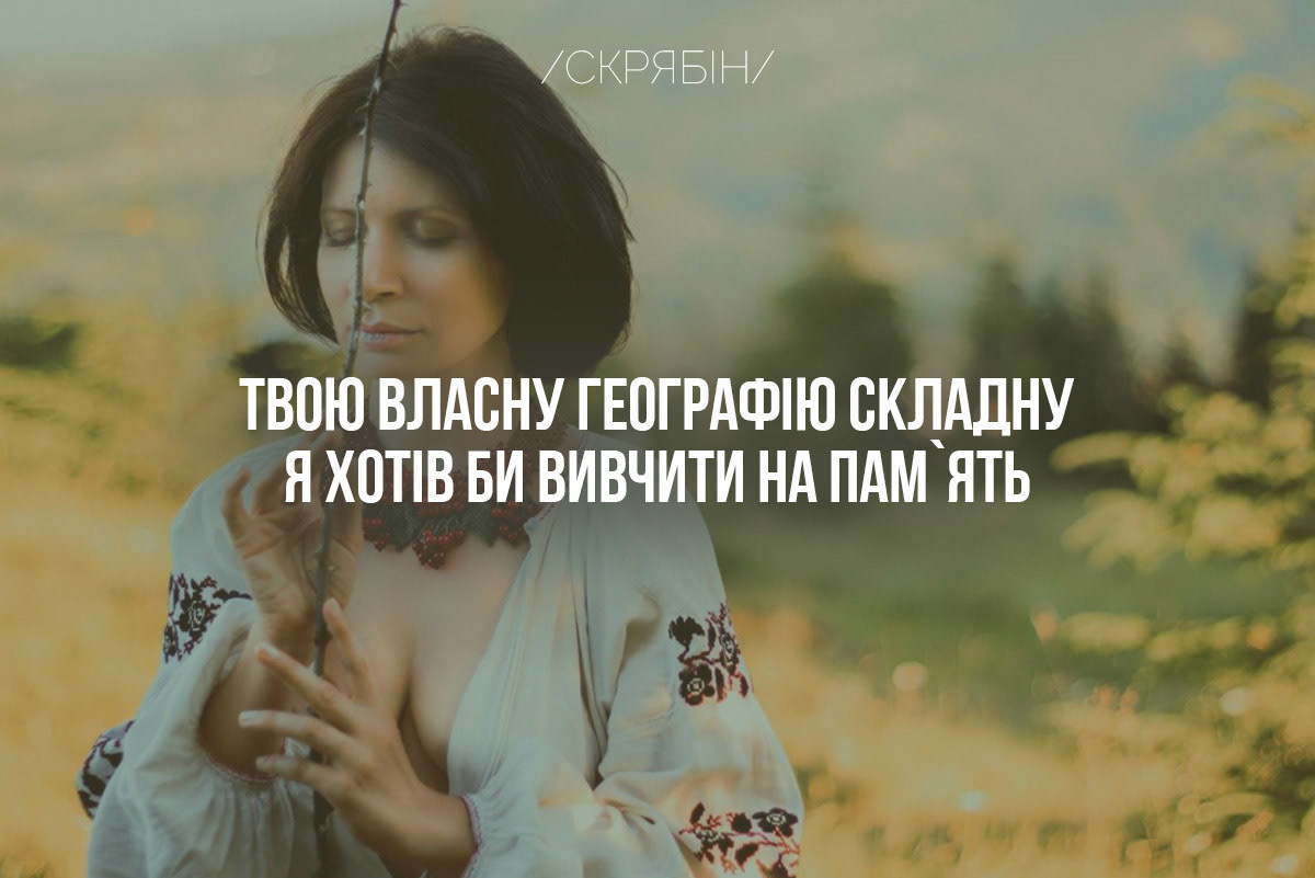 The state coat of arms of Ukraine, Tryzub, against background Dynamivska str barricades on fire. Euromaidan Protests. Events of Jan 19, 2014.