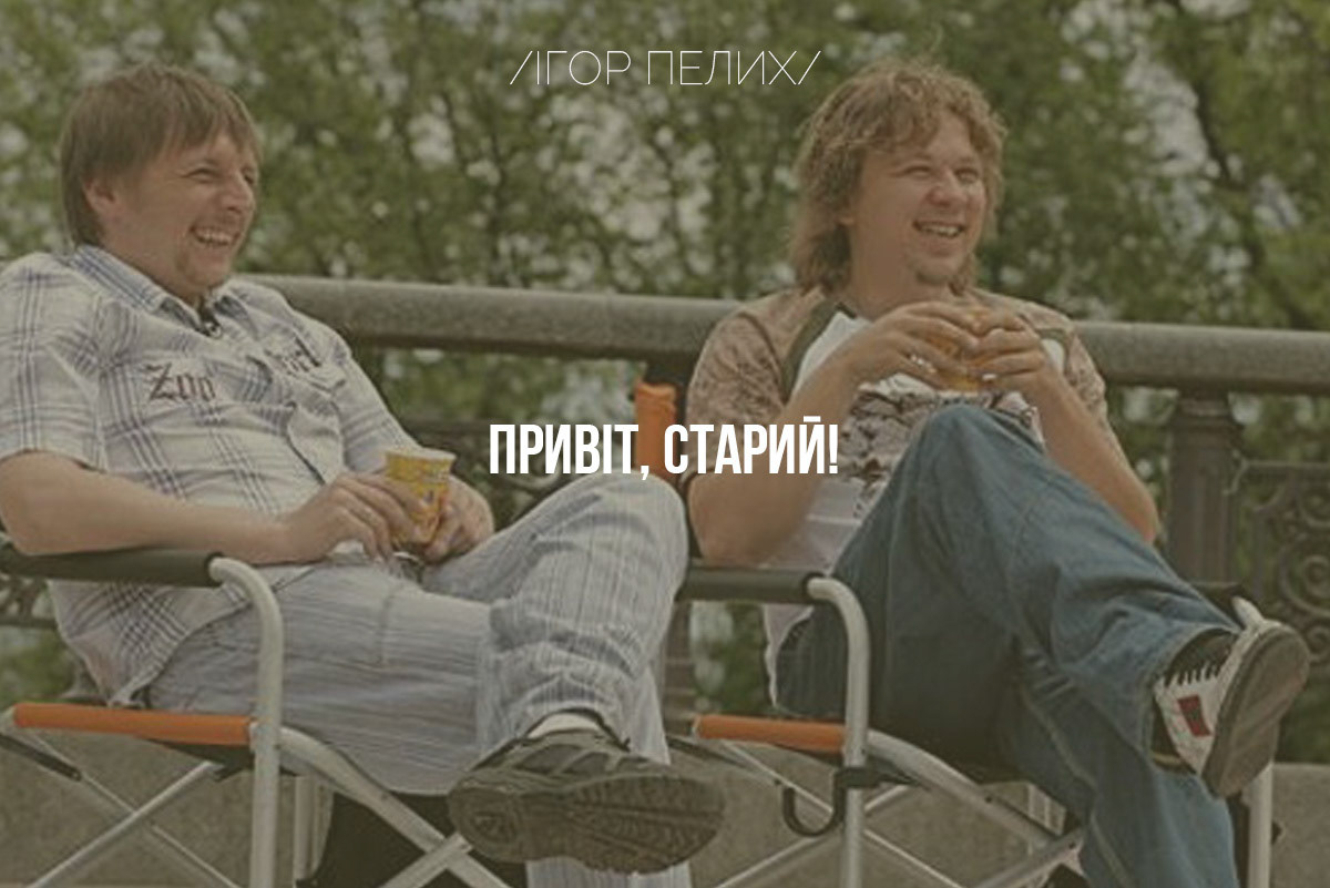 The state coat of arms of Ukraine, Tryzub, against background Dynamivska str barricades on fire. Euromaidan Protests. Events of Jan 19, 2014.