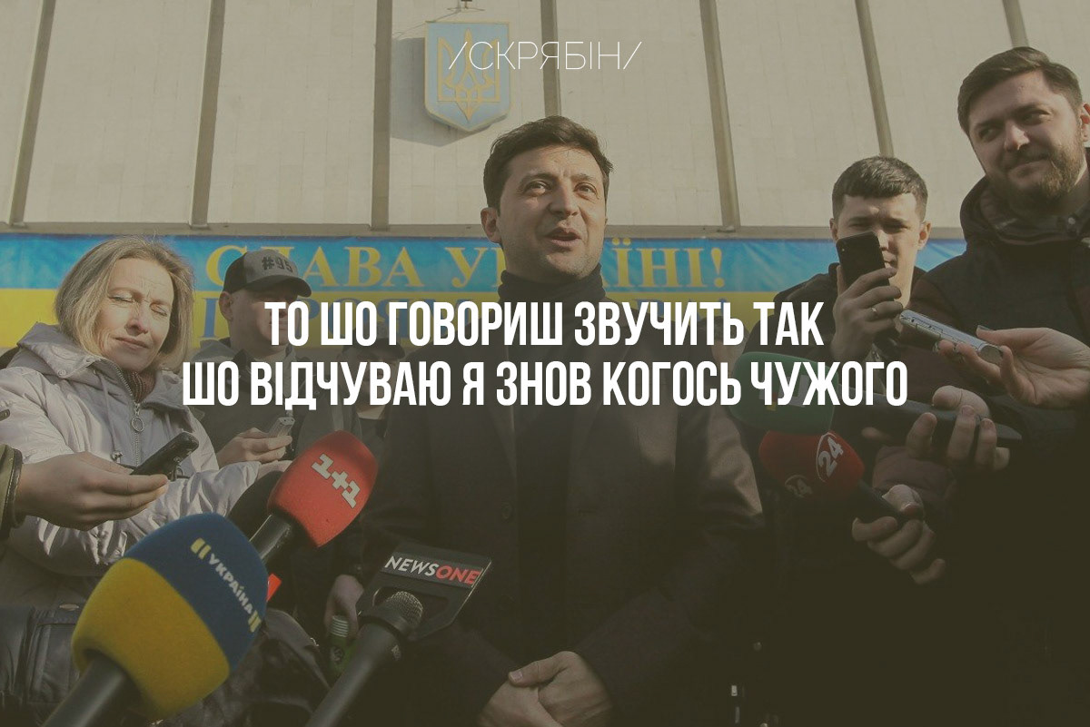 The state coat of arms of Ukraine, Tryzub, against background Dynamivska str barricades on fire. Euromaidan Protests. Events of Jan 19, 2014.