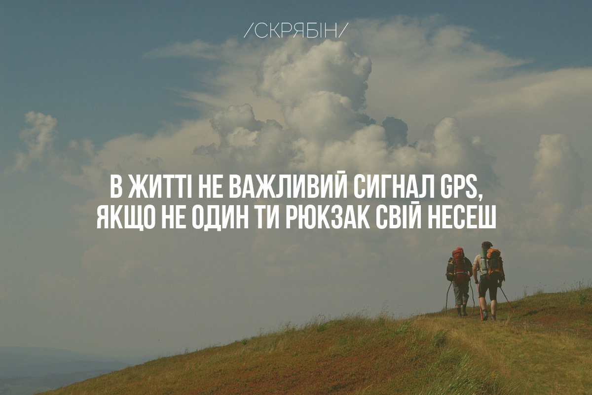 The state coat of arms of Ukraine, Tryzub, against background Dynamivska str barricades on fire. Euromaidan Protests. Events of Jan 19, 2014.