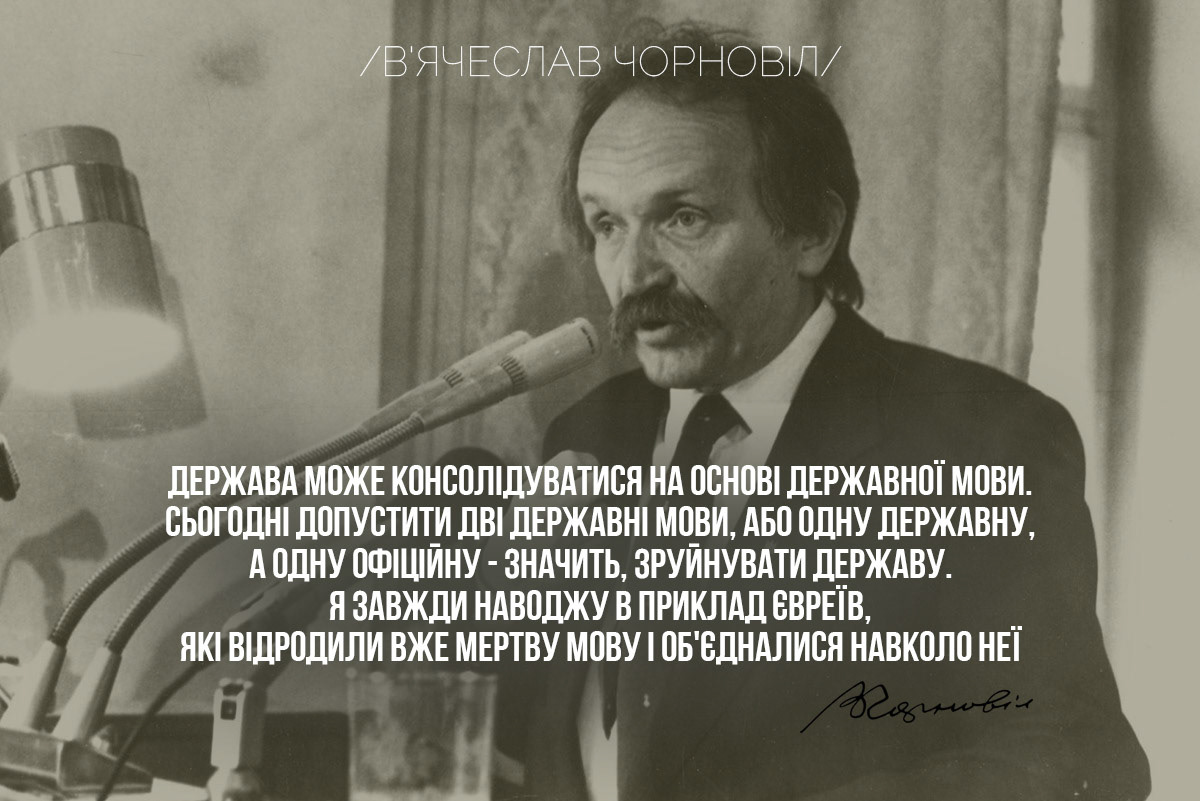 The state coat of arms of Ukraine, Tryzub, against background Dynamivska str barricades on fire. Euromaidan Protests. Events of Jan 19, 2014.