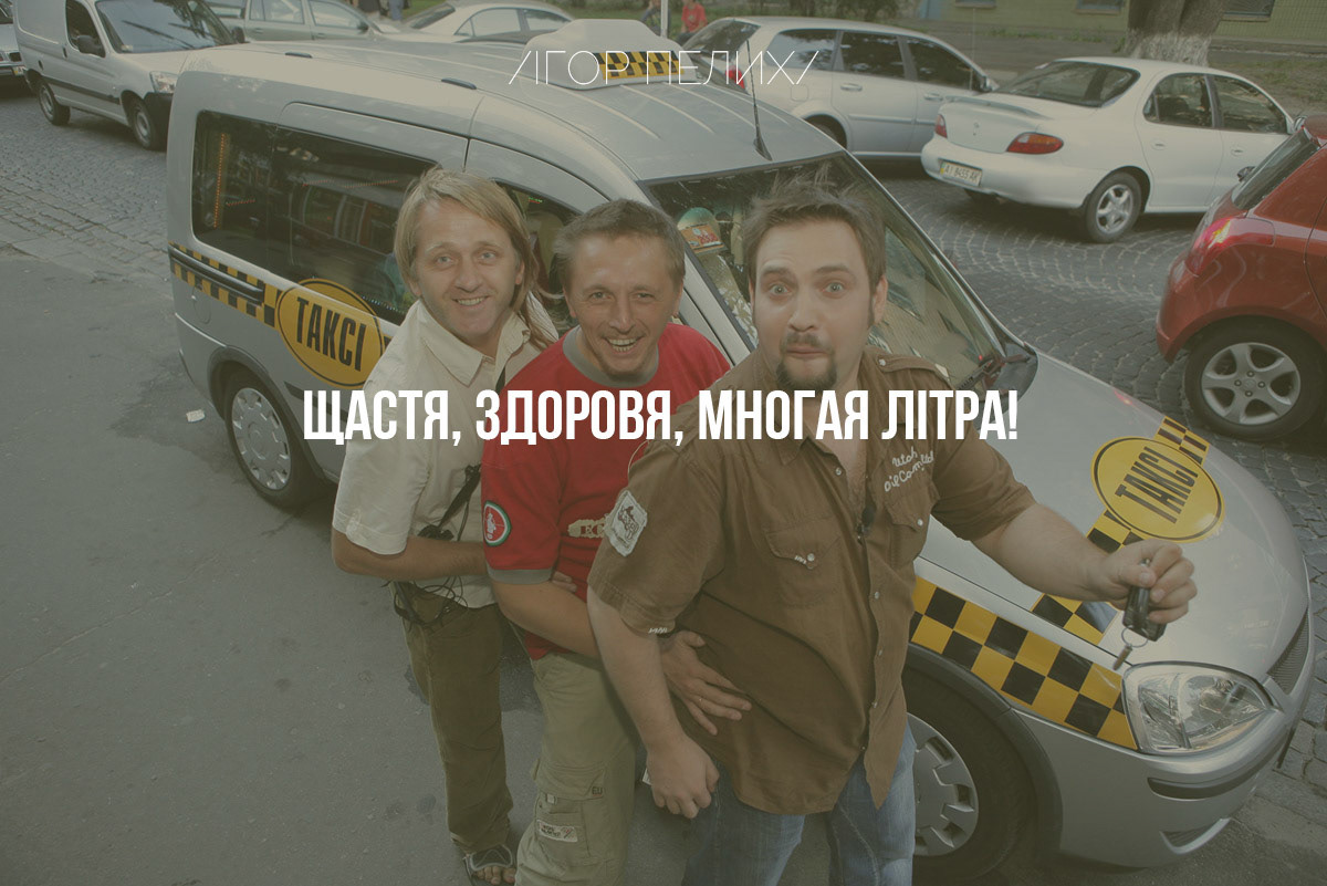 The state coat of arms of Ukraine, Tryzub, against background Dynamivska str barricades on fire. Euromaidan Protests. Events of Jan 19, 2014.