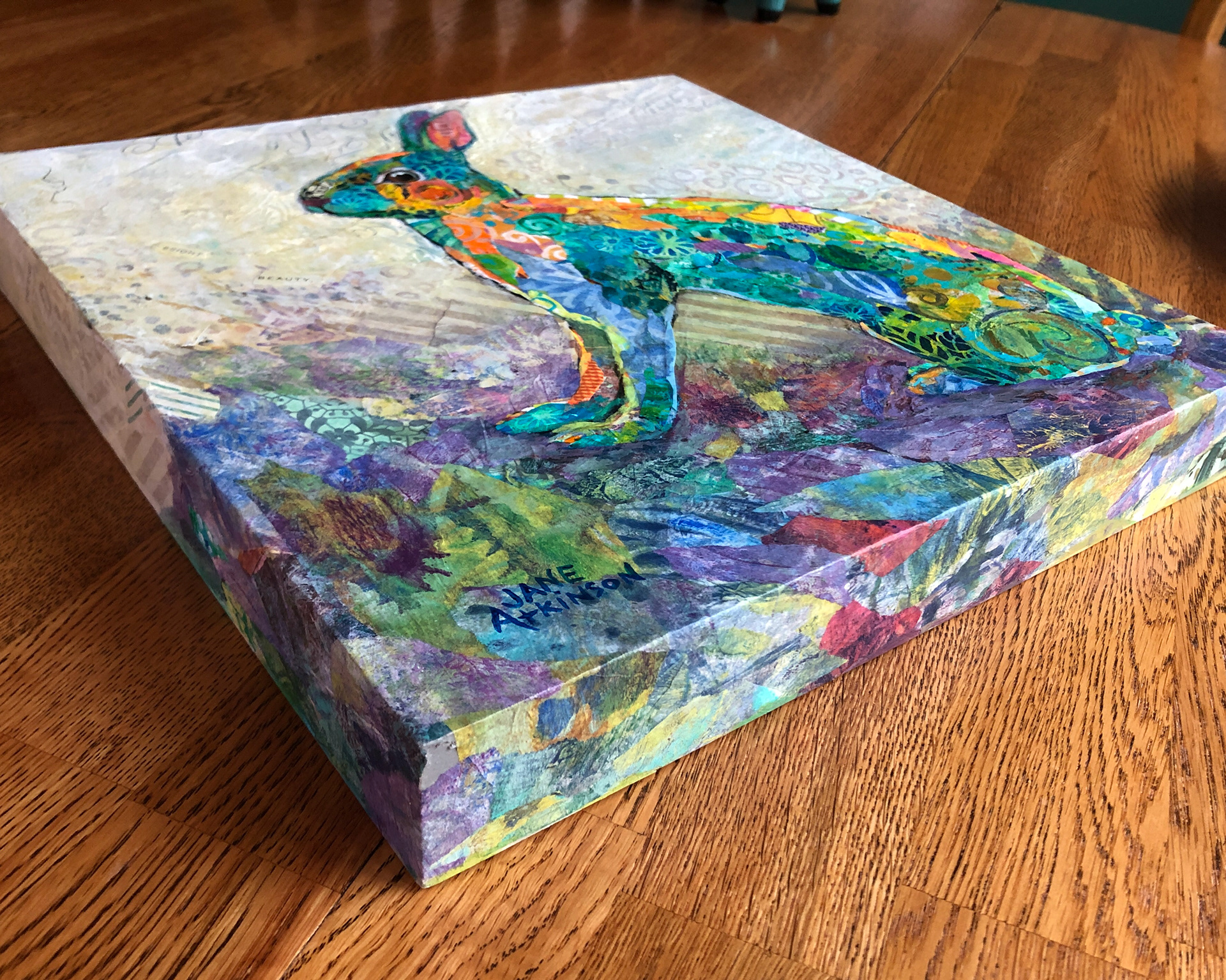 View of "Bright Beauty" showing the image wrapping around the sides of the board