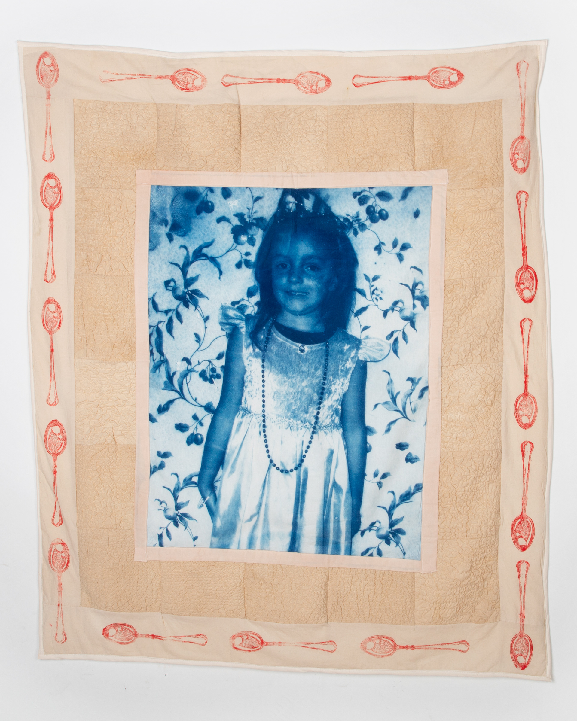 Cotton cyanotype print, machine quilted, cotton fabrics dyed with tea and coffee, cotton batting, and laser-etched stamp. 43" x 36"