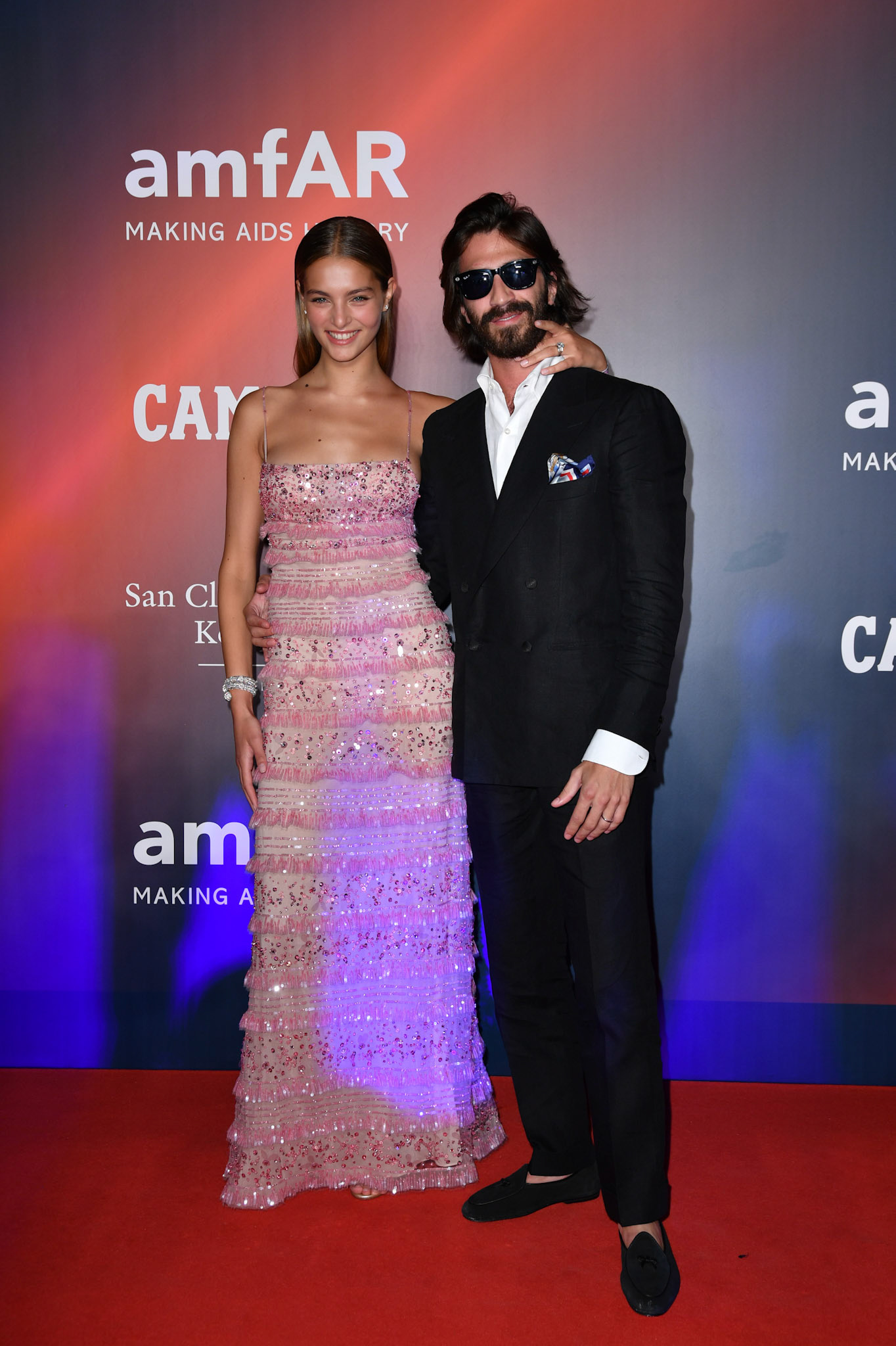 Anna Castellini Baldissera and Leonardo Maria del Vecchio are seen at AmfAR