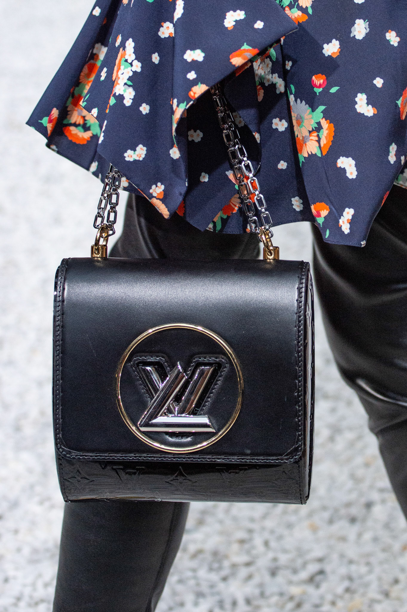 A model, bag detail, walks the runway during Louis Vuitton 2019 Cruise Collection at Fondation Maeght on May 28, 2018 in Saint-Paul-De-Vence, France