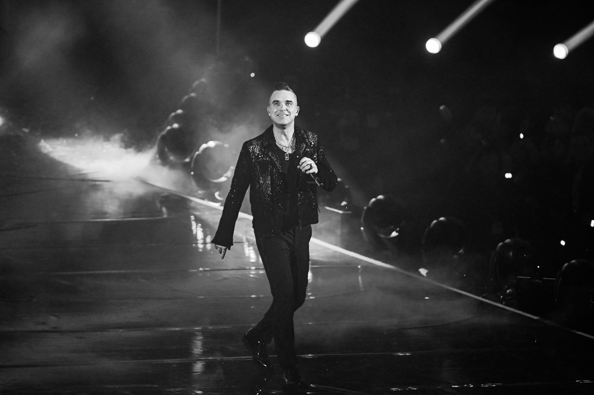 Robbie Williams performs on stage during X Factor 2019 Final at Mediolanum Forum of Assago on December 12, 2019 in Milan, Italy