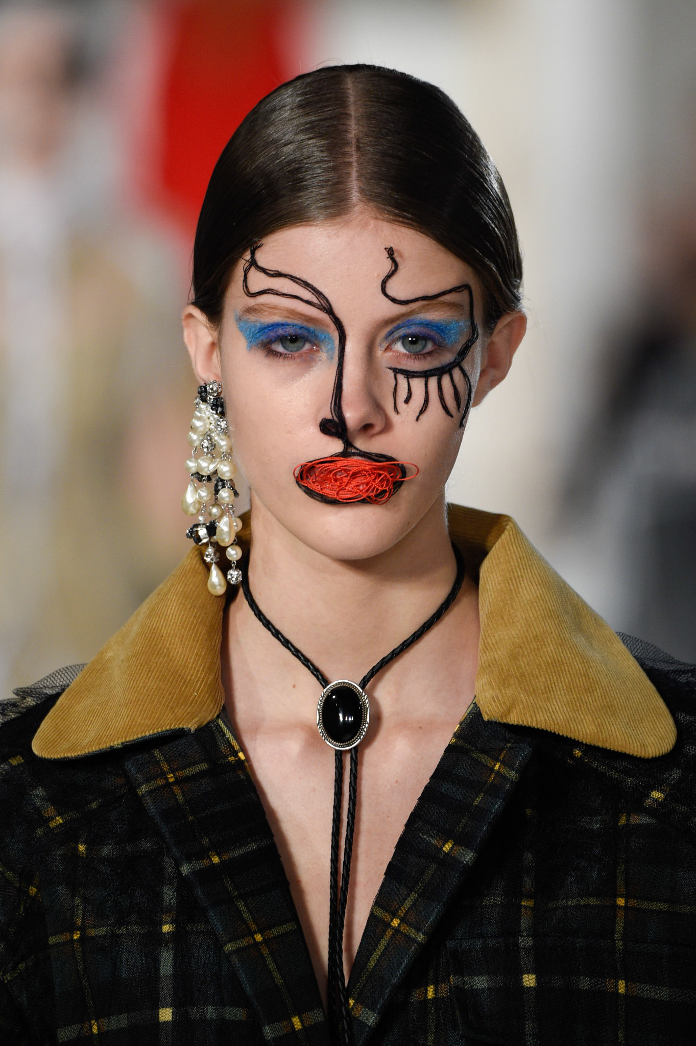 A model, beauty detail, walks the runway during the Maison Margiela Spring Summer 2017 show as part of Paris Fashion Week on January 25, 2017 in Paris, France