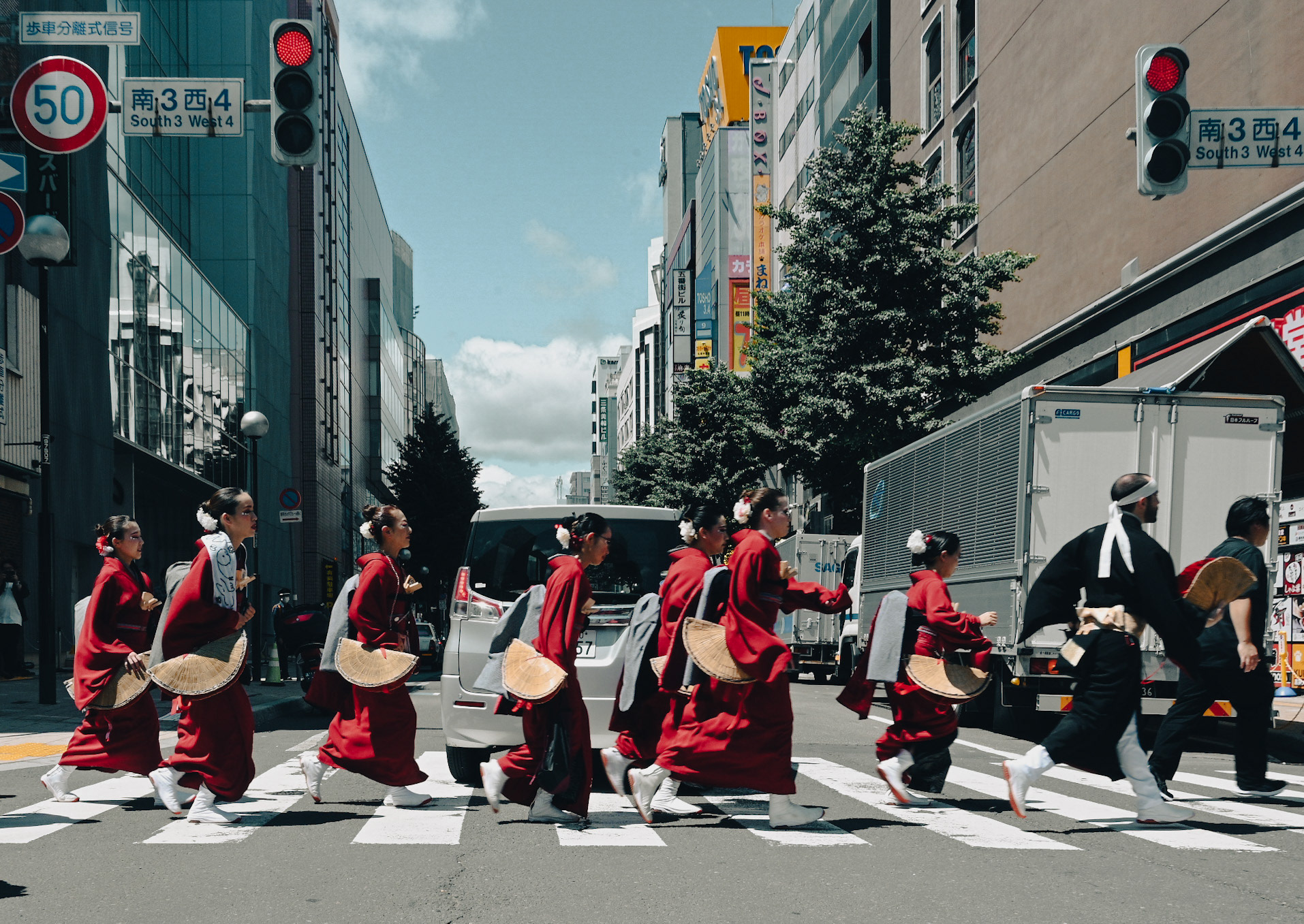 Rushing to the venue for the Yosakoi - Sapporo