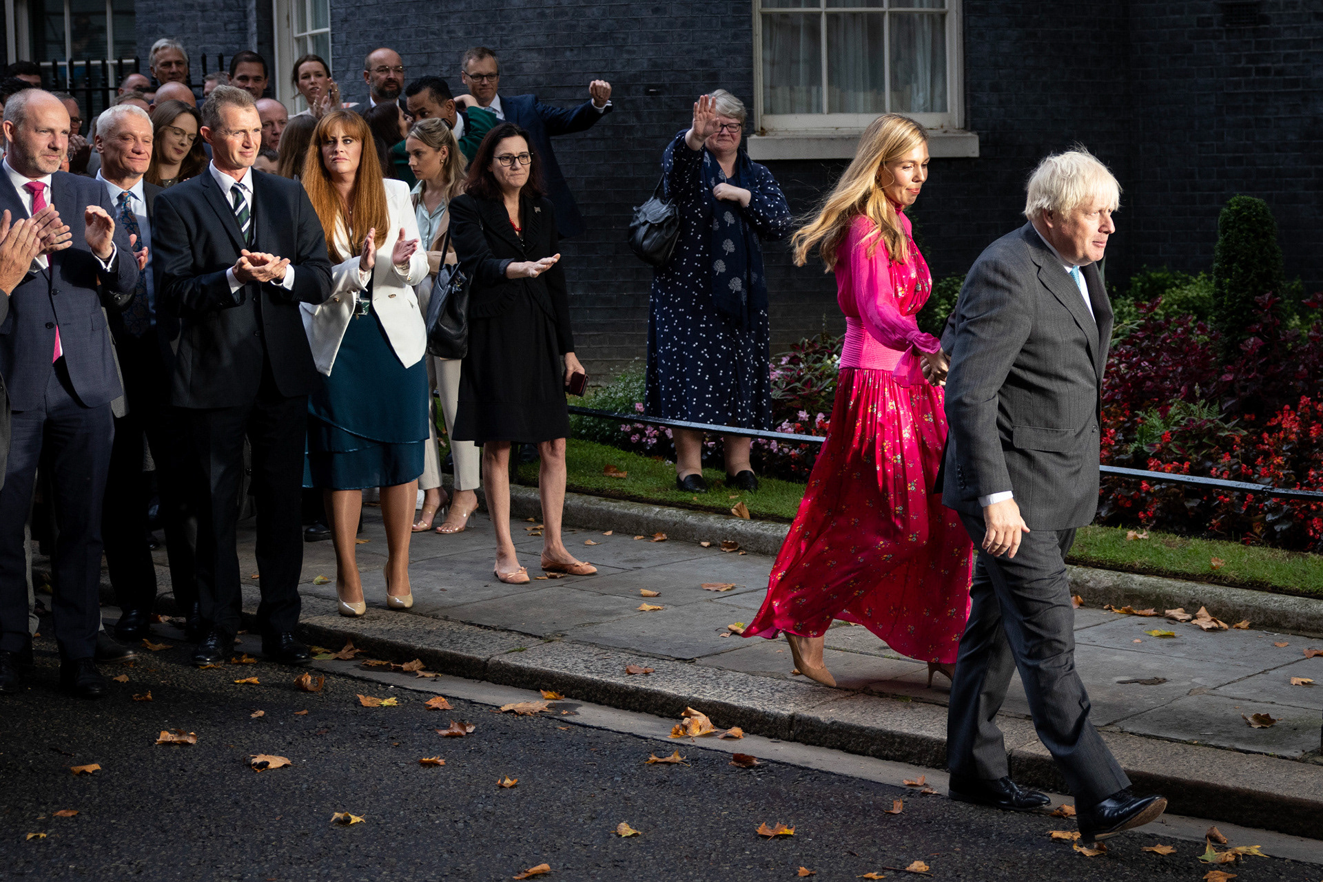 Outgoing British Prime Minister Boris Johnson and his wife Carrie Johnson leave Downing Street 