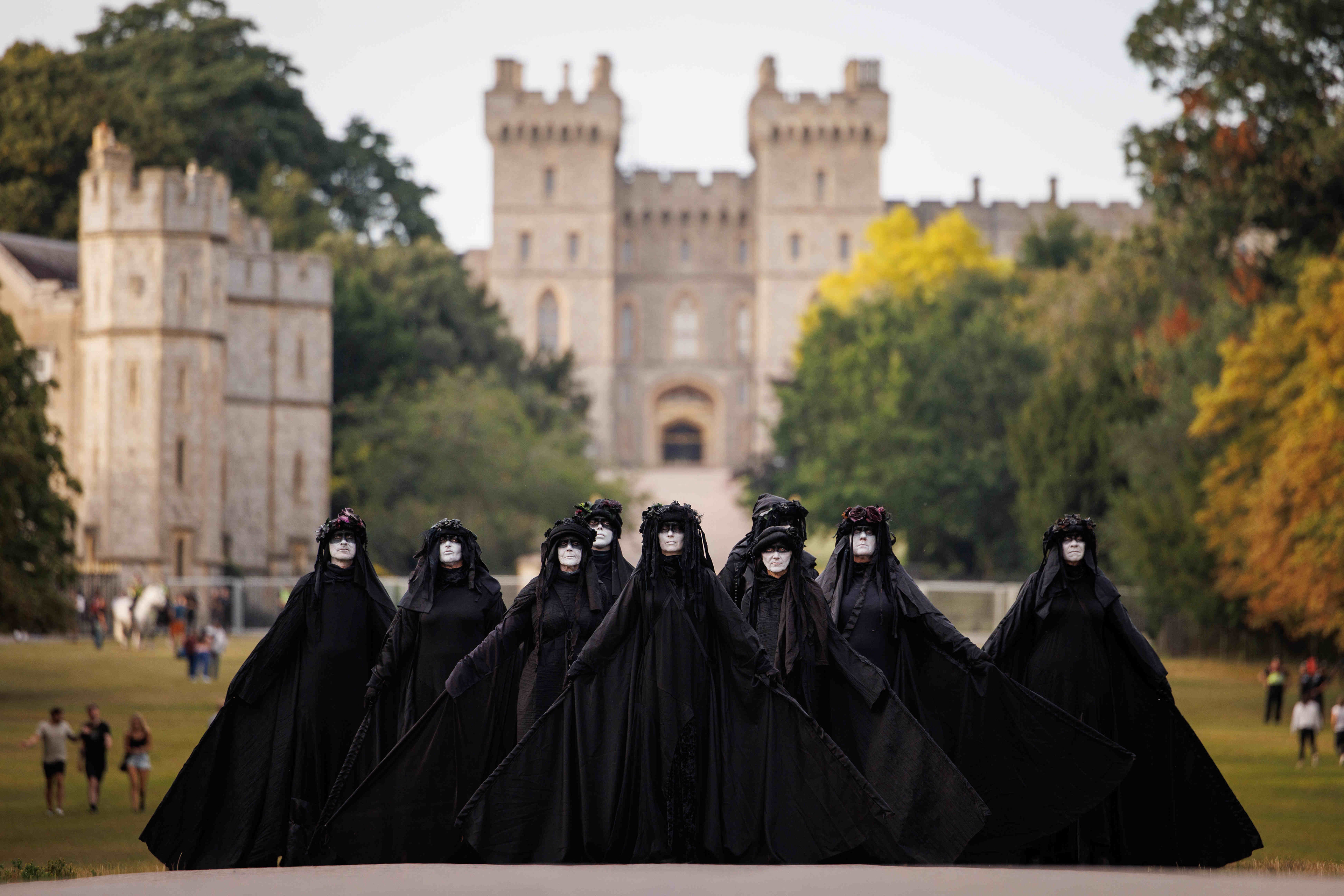 Climate protesters from Extinction Rebellion known as ‘Oil Slicks’ stage a protest