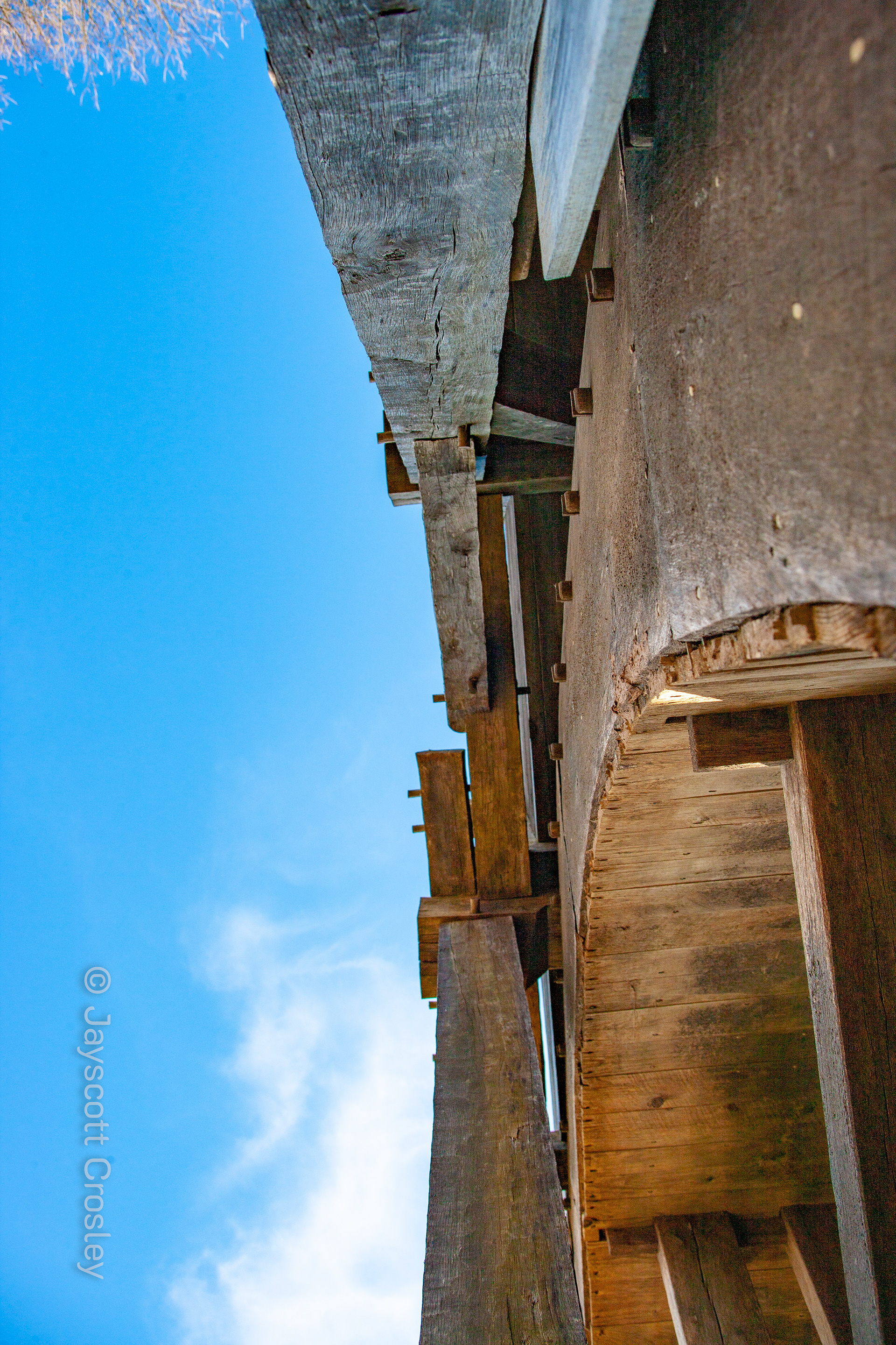 Saugus Iron Works_2-21-22_Saugus_MA_ Part of the “You can take it lying down” safari, lying on my back looking up one of the many mill wheels at Saugus Iron Works. 1/500_f7.1_ ISO 200 photo by Jayscott Crosley