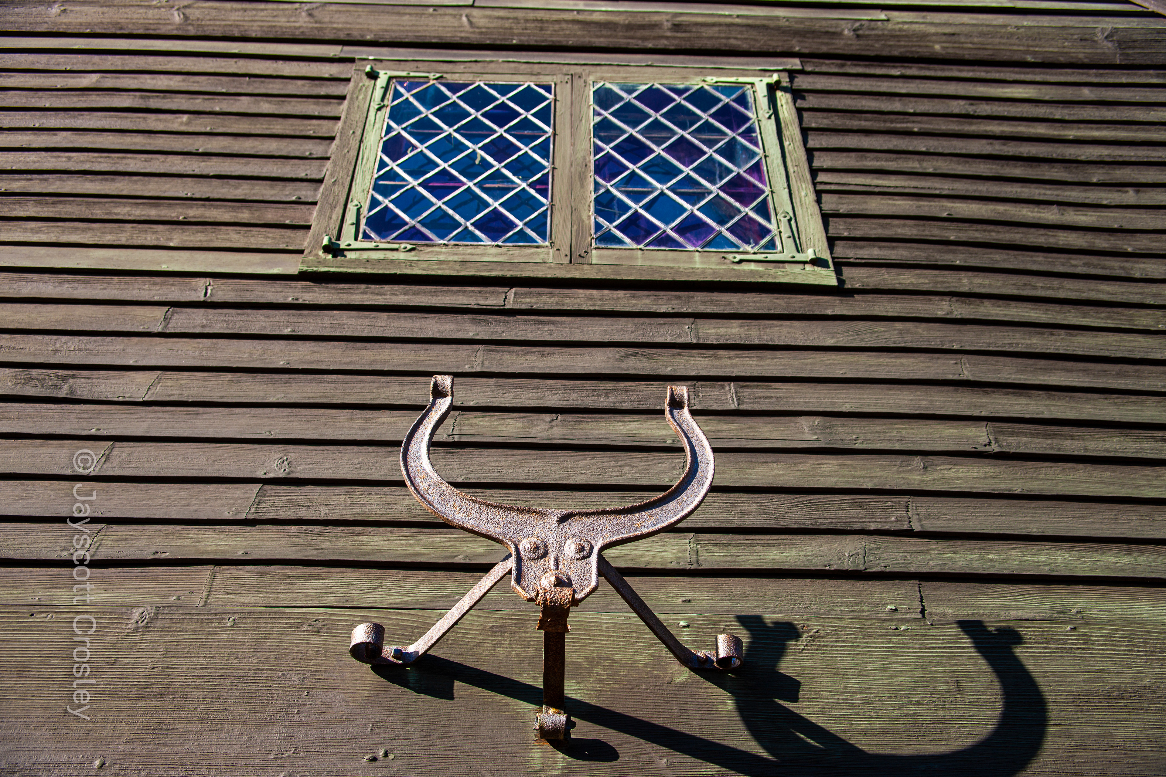 Saugus Iron Works_2-21-22_Saugus_MA_ Part of the “You can take it lying down” safari, The Iron Works House's lucky horse shoe above the door. The house is the only original structure at the Historic Site dating back to the 1600s. photo by Jayscott Crosley