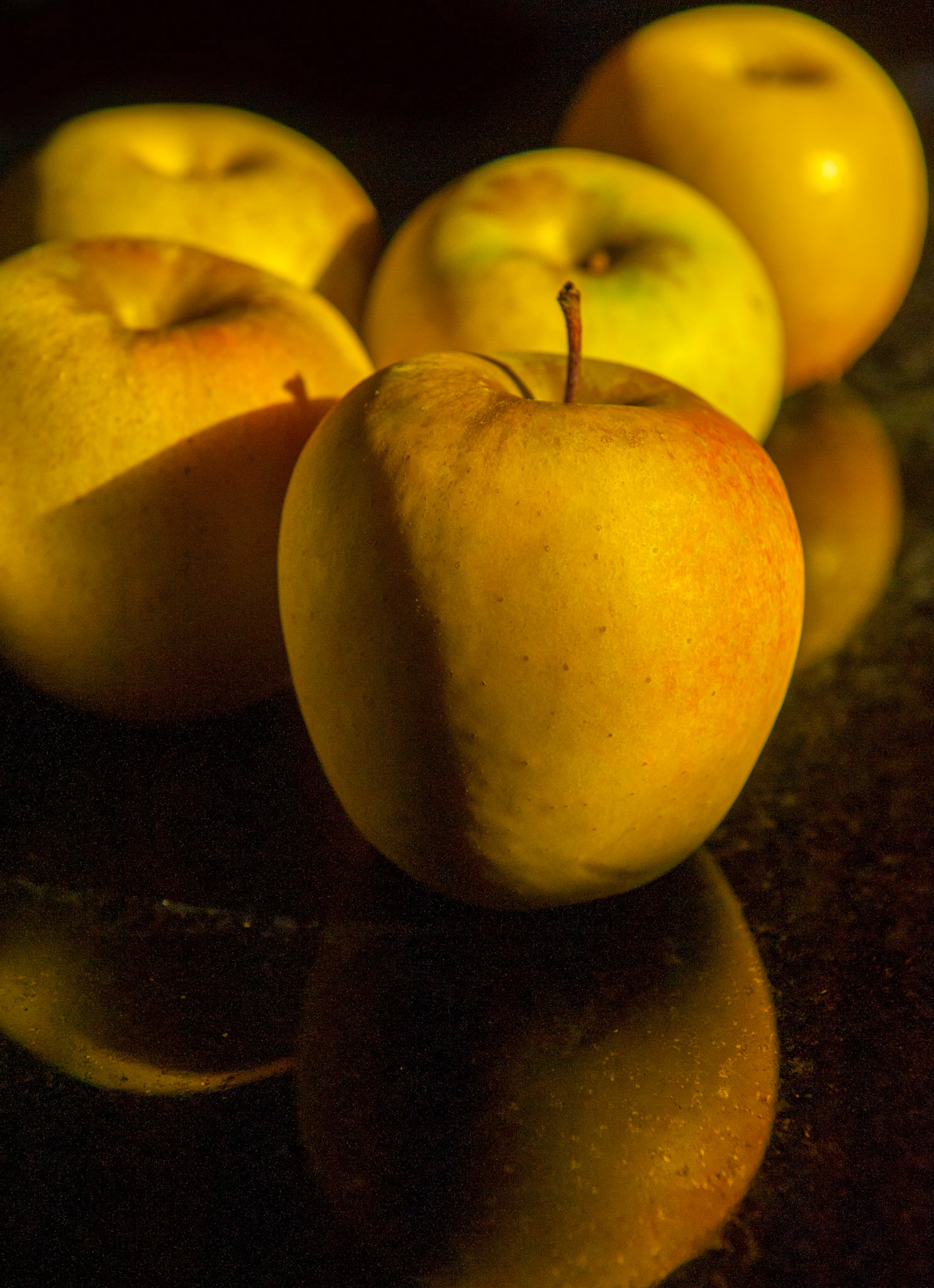 Apples on granite.