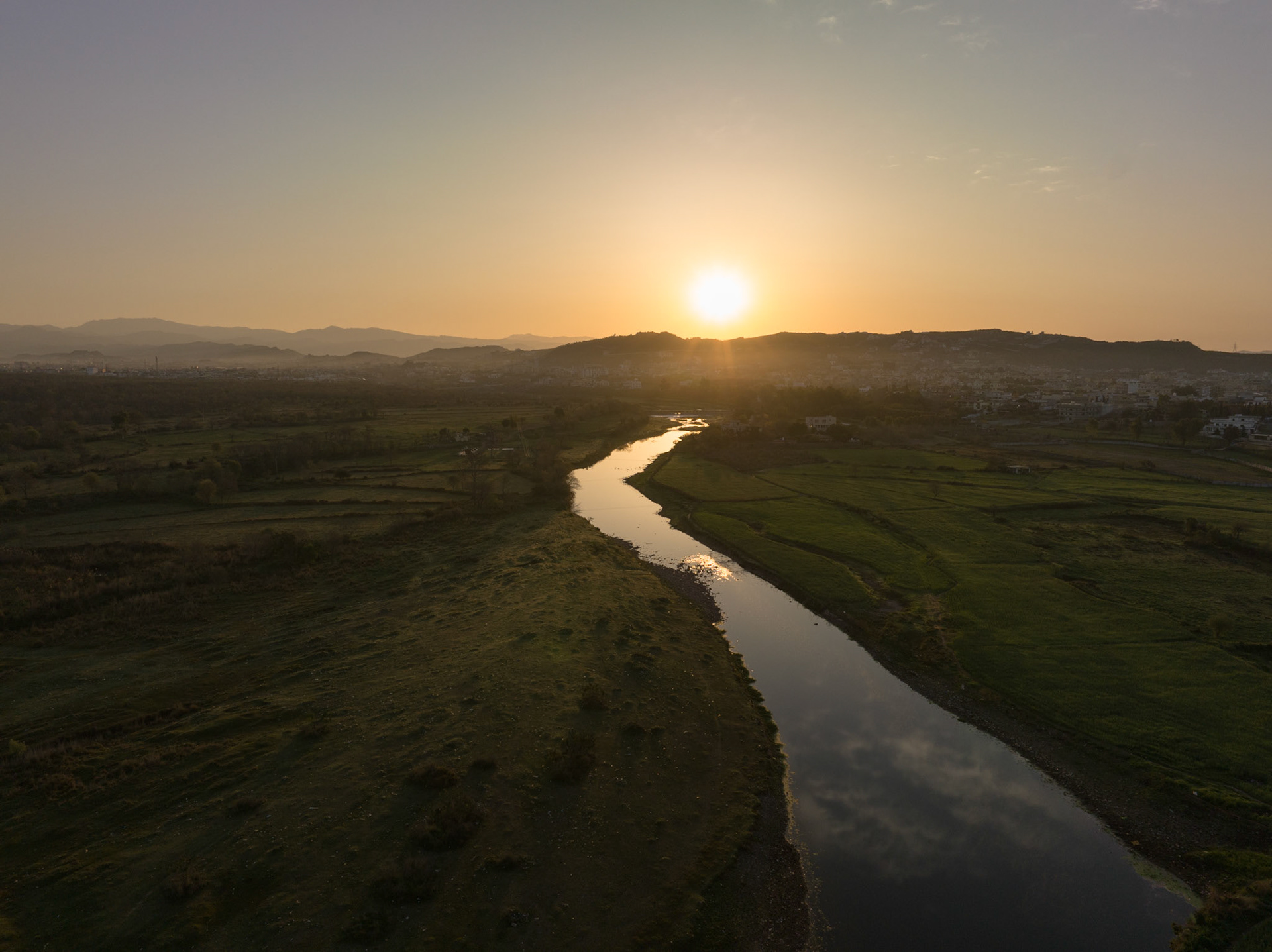 Aerial view of sun rising over Bani Gala in the outskirts of Islamabad, capital of Pakistan