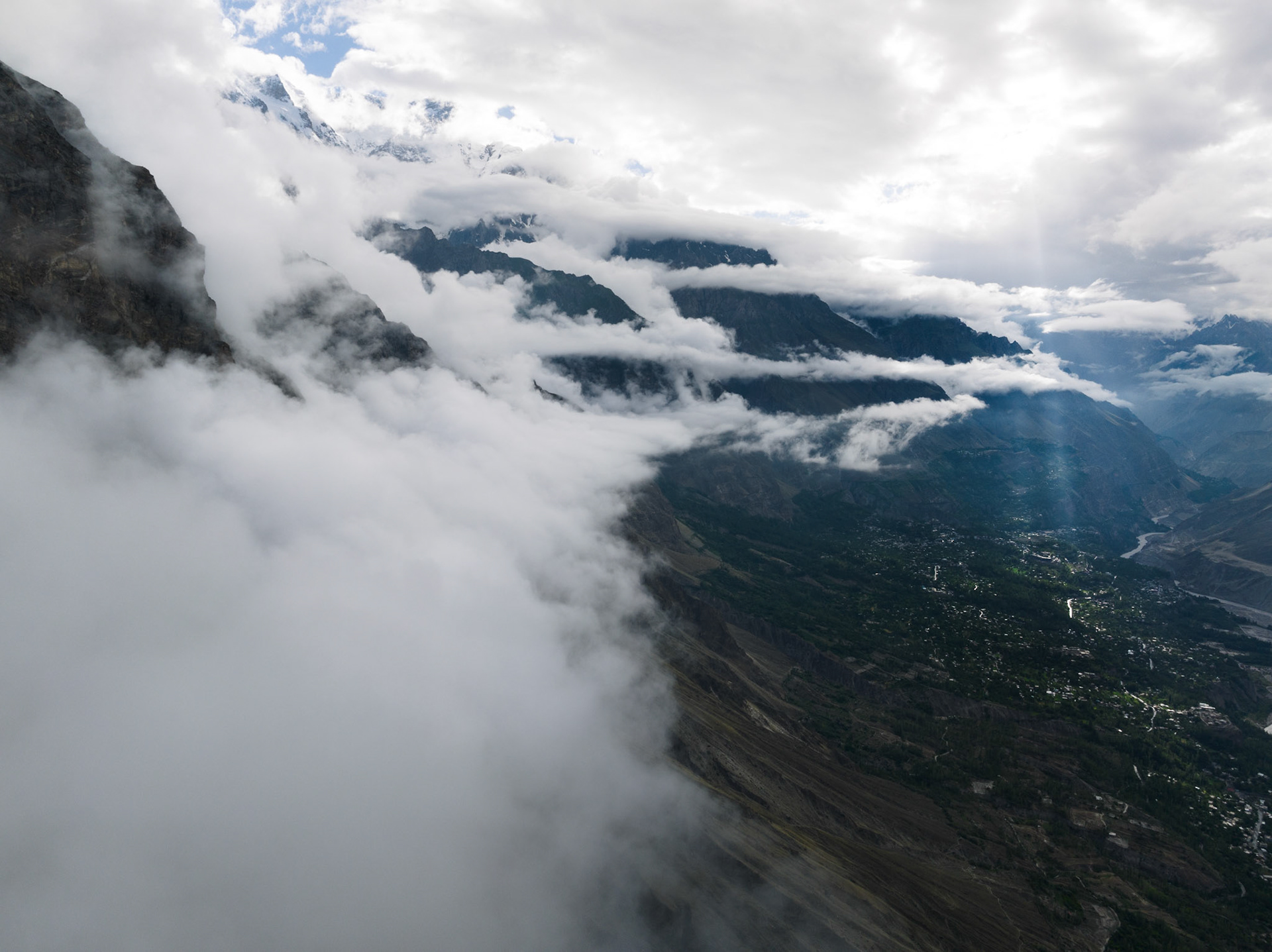 Aerial view of mountain decorated by clouds in Hunza Valley, Pakistan