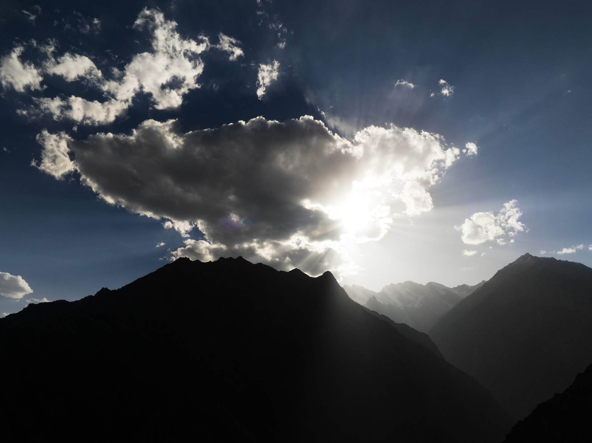 Aerial view of sun seting in the back of mountains in Hunza Valley, Pakistan