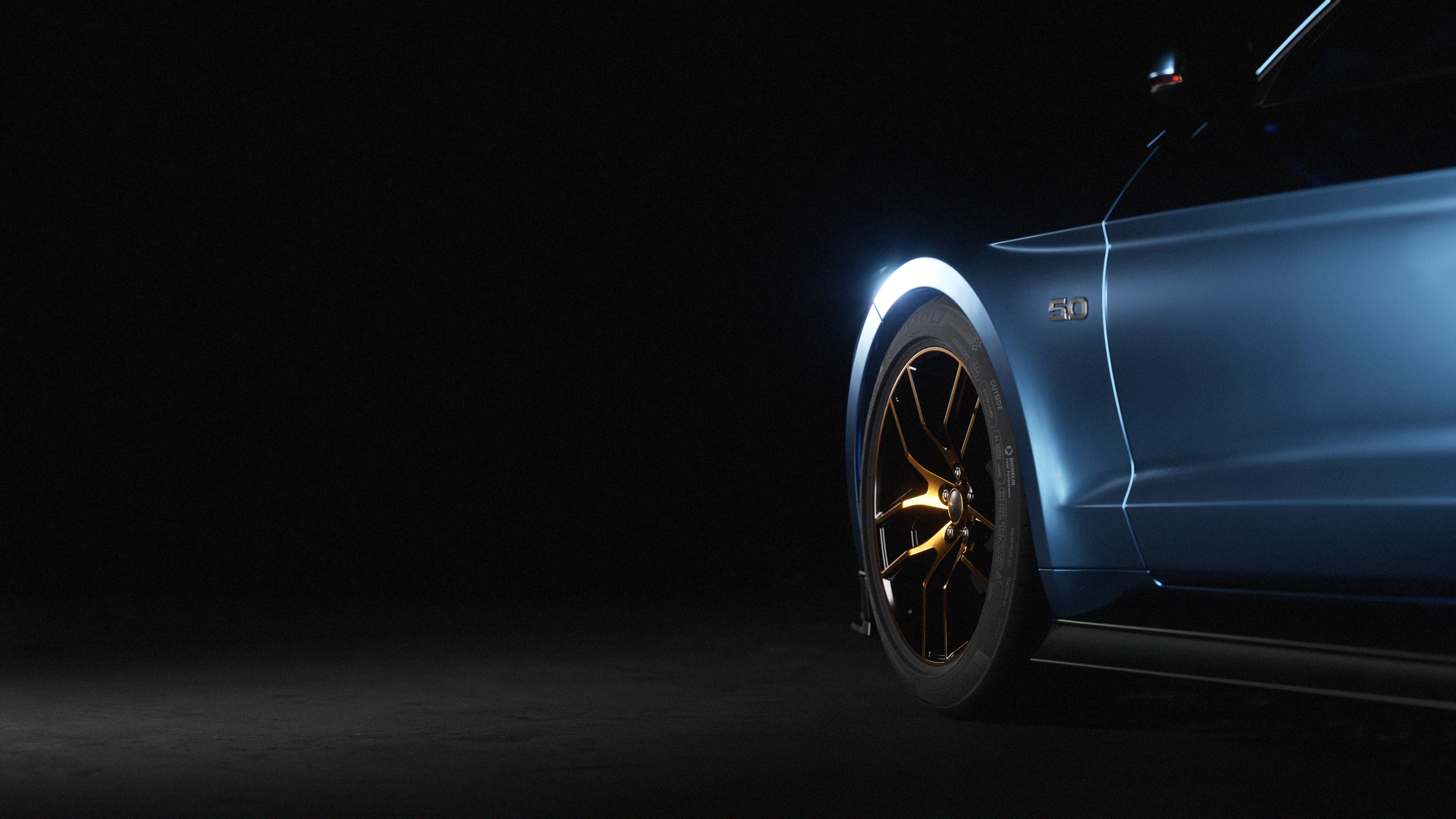 Close-up 3D visualization of a blue ford mustang’s front side with a "5.0" badge, showcasing alloy wheel.