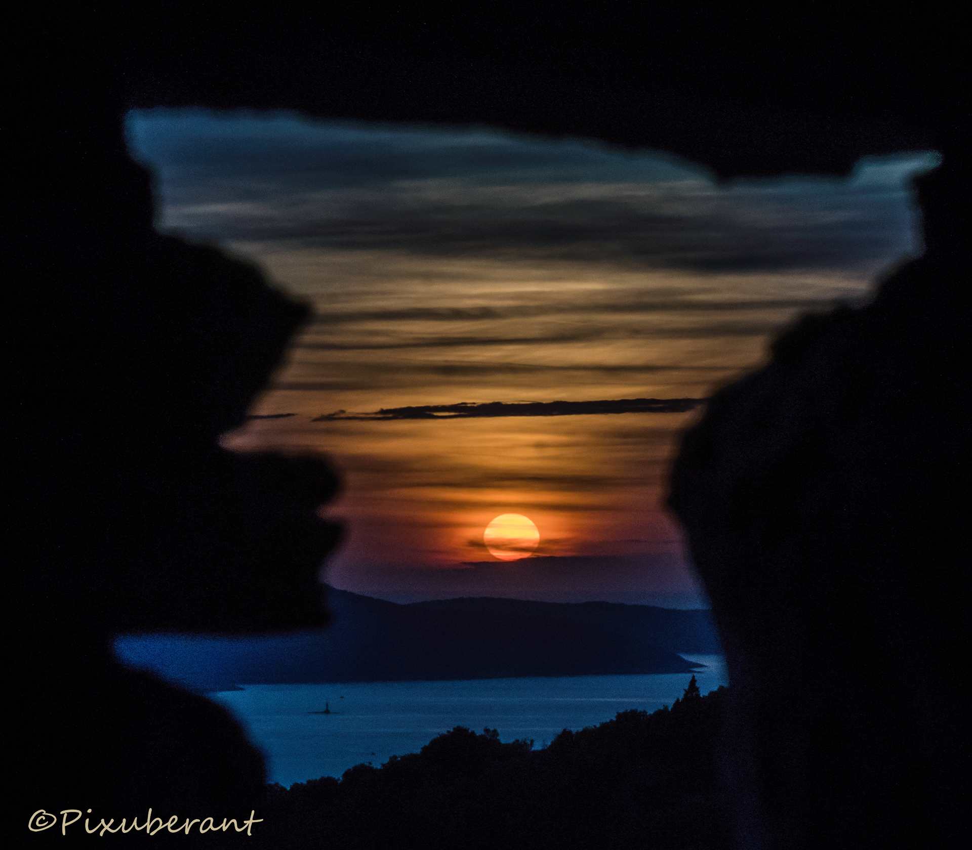 view of sunset through fortress wall