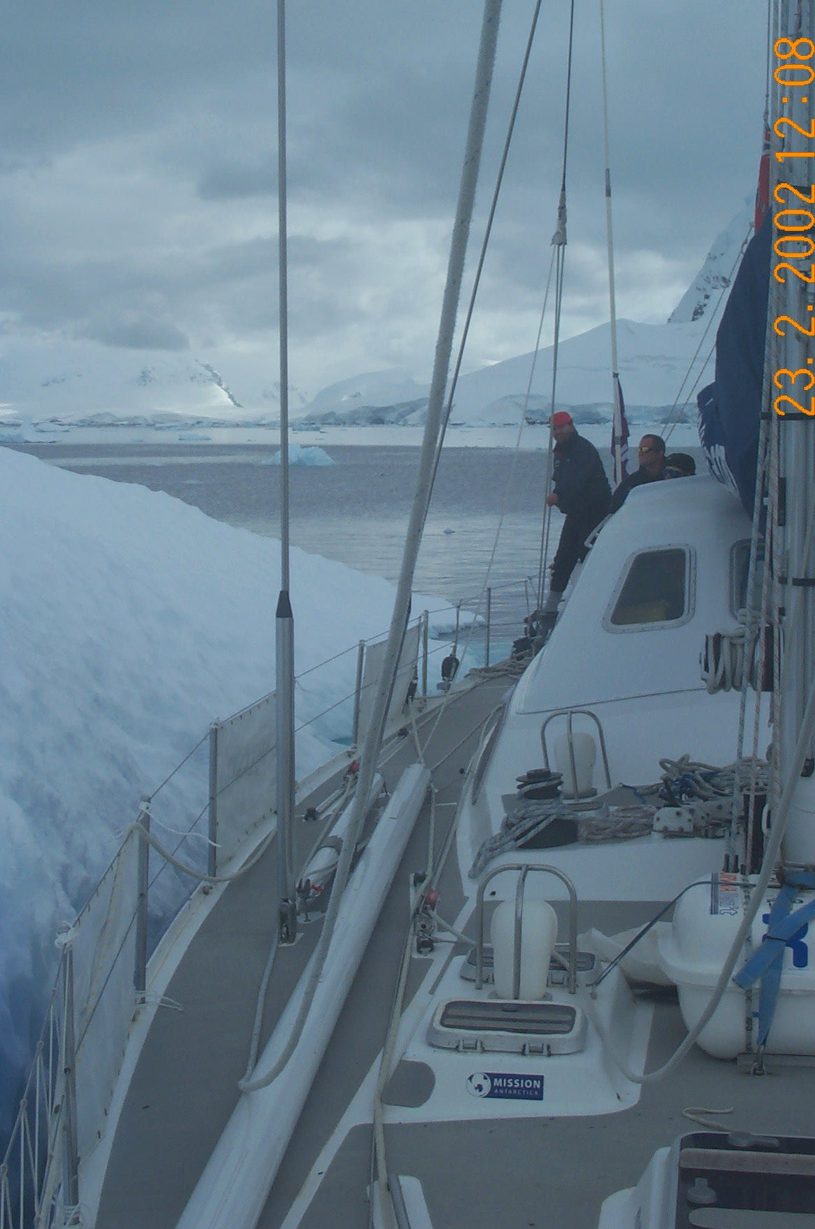 2041 nestled against iceberg