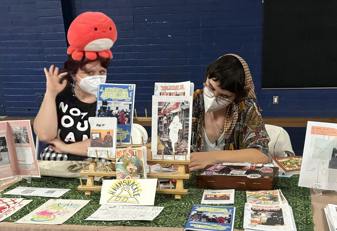 The artists tabling at Oceanside Zine Fest, 2024.