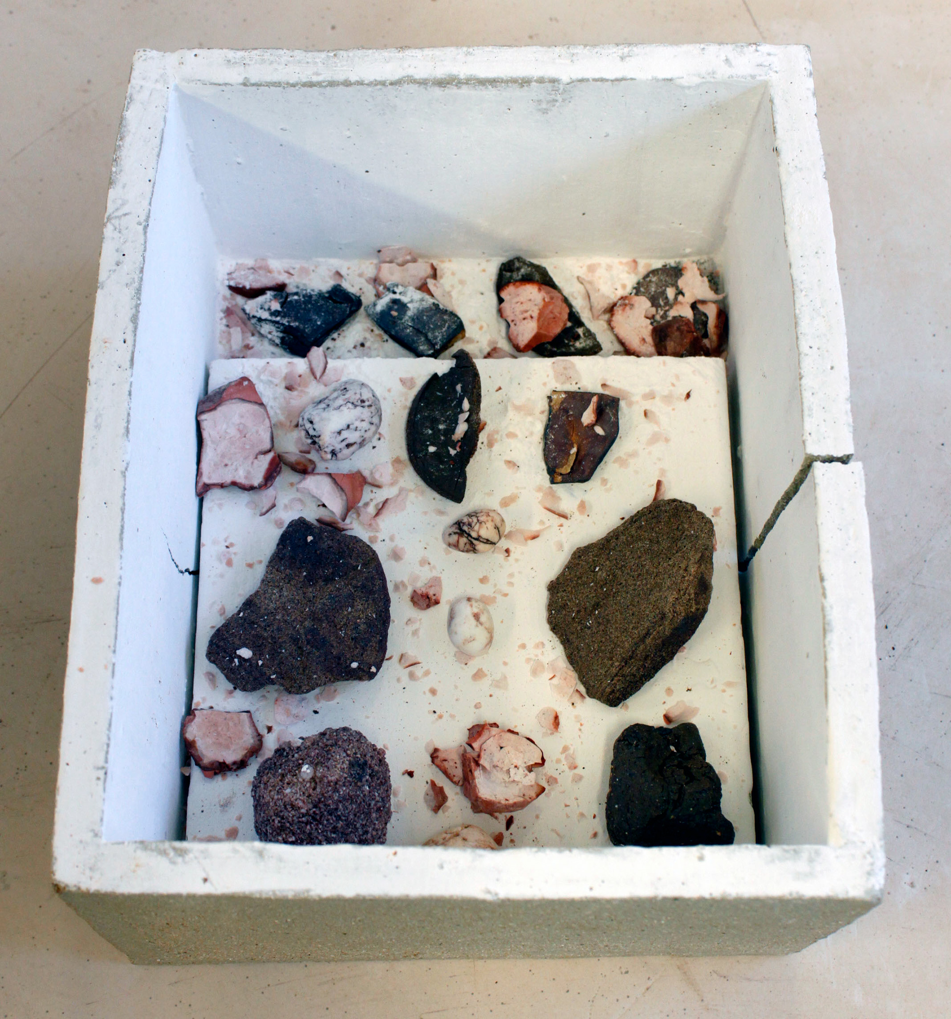 Pieces post firing. Notice the flint that when fired exploded inside the saagar.