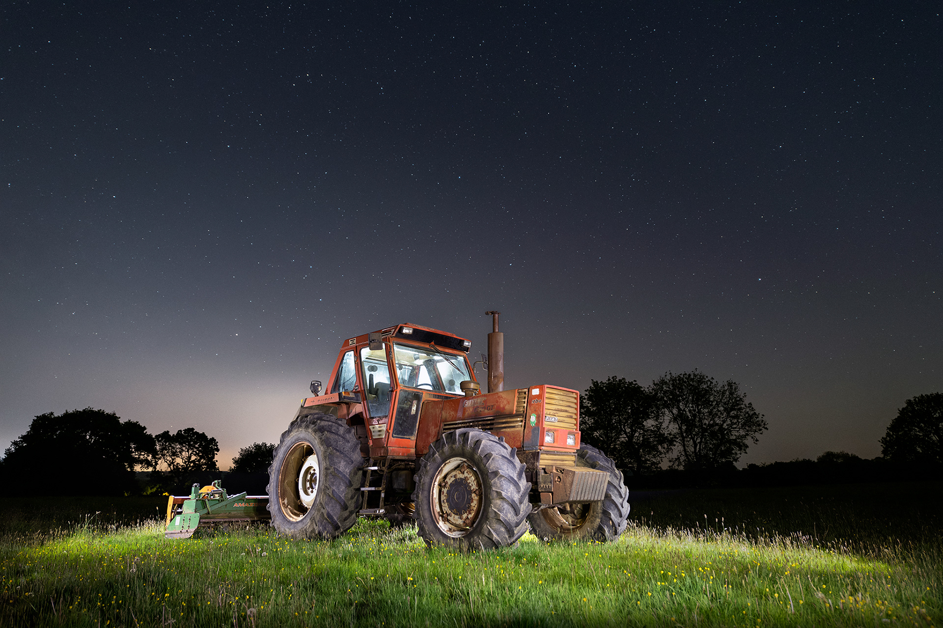 Red Tractor at Night....