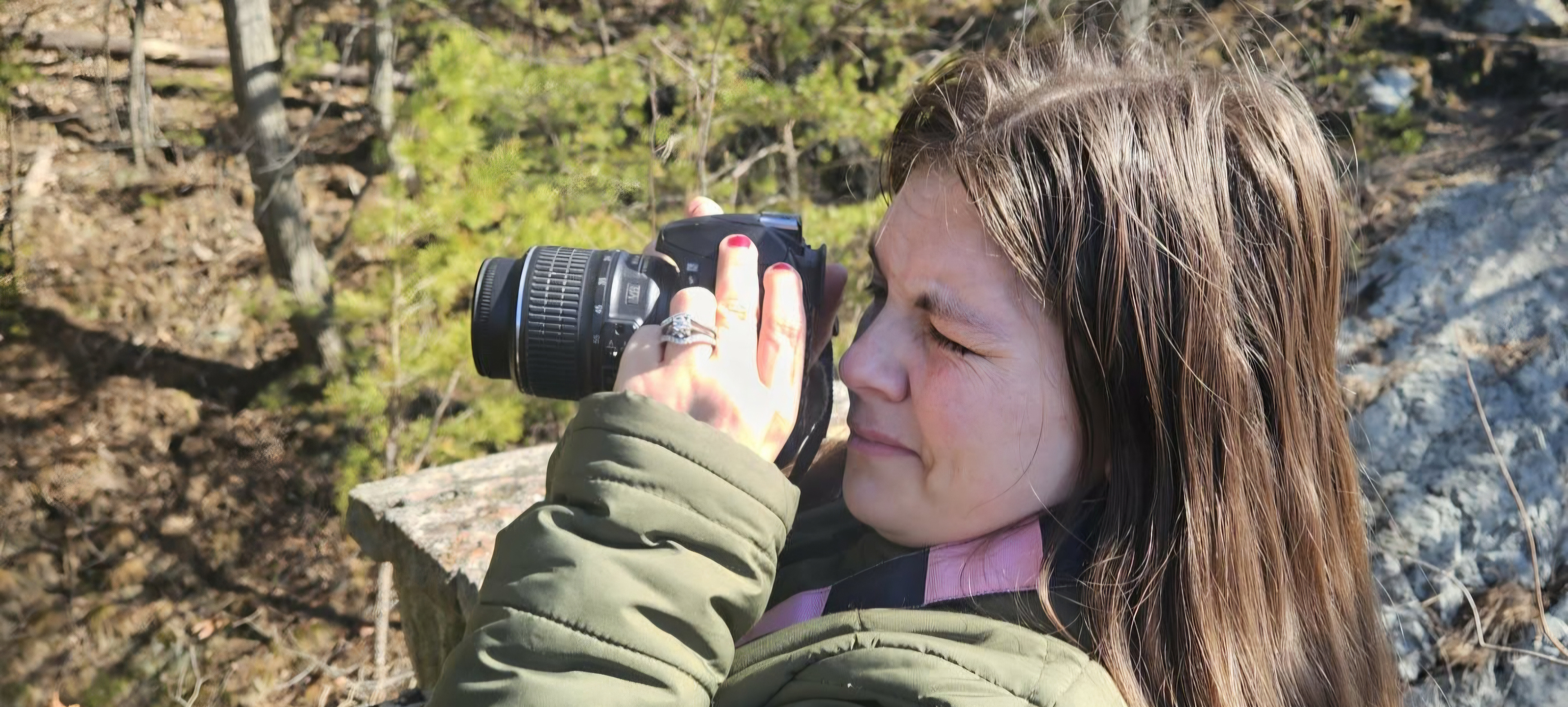 An image of Millie taking photos on her Nikon D3100 at Chickie's Park