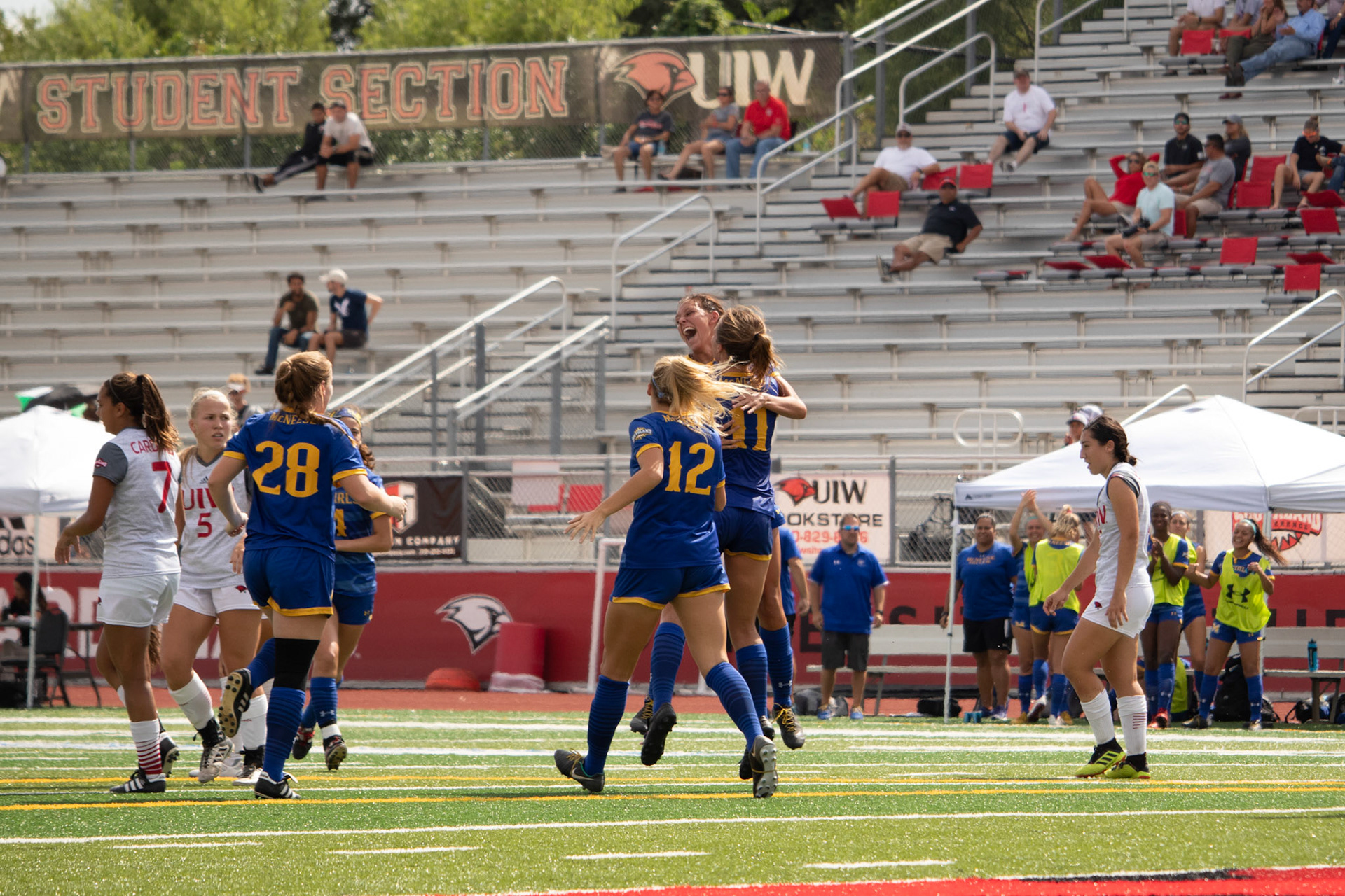 24 - Alexis Miller, 11 - Nola Prickett, 12 - Maddie Neidig, 28 - Delana Friesen