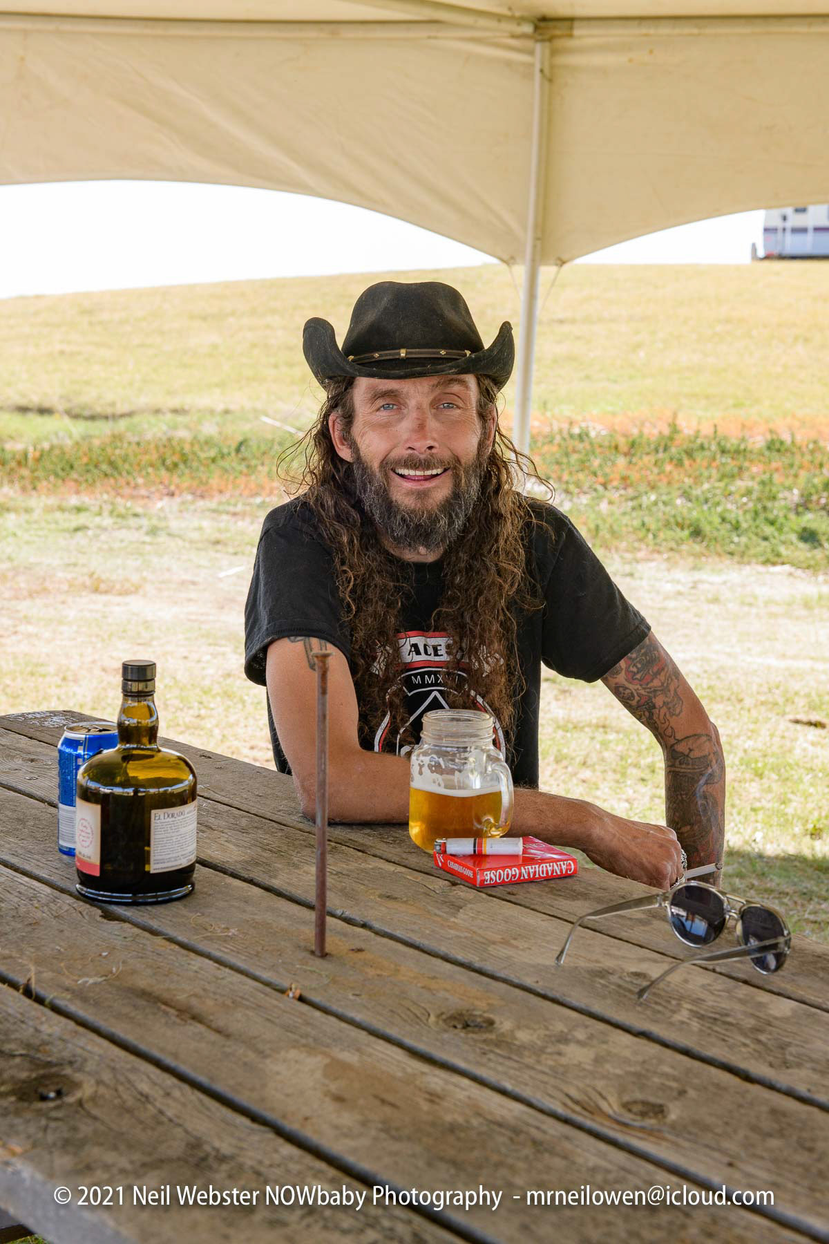 The coolest Guy. He was doing construction, painting, raising tents,drinking beer, then he performed on Sunday night.