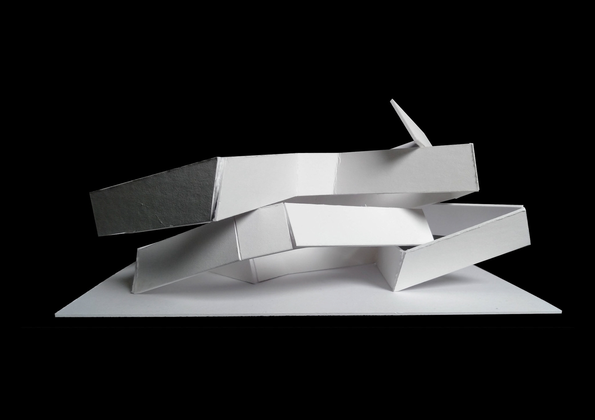 2. A continuous vertical strip with undulations forming a façade.