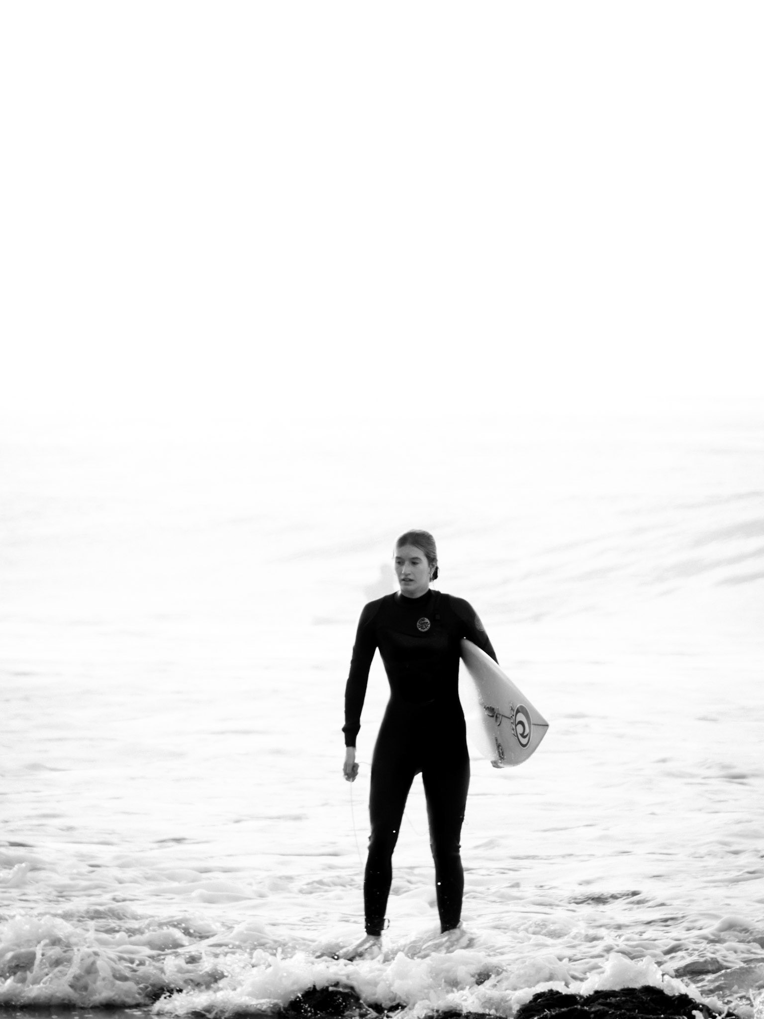 Surfer with a board at Belles Beach, Victoria