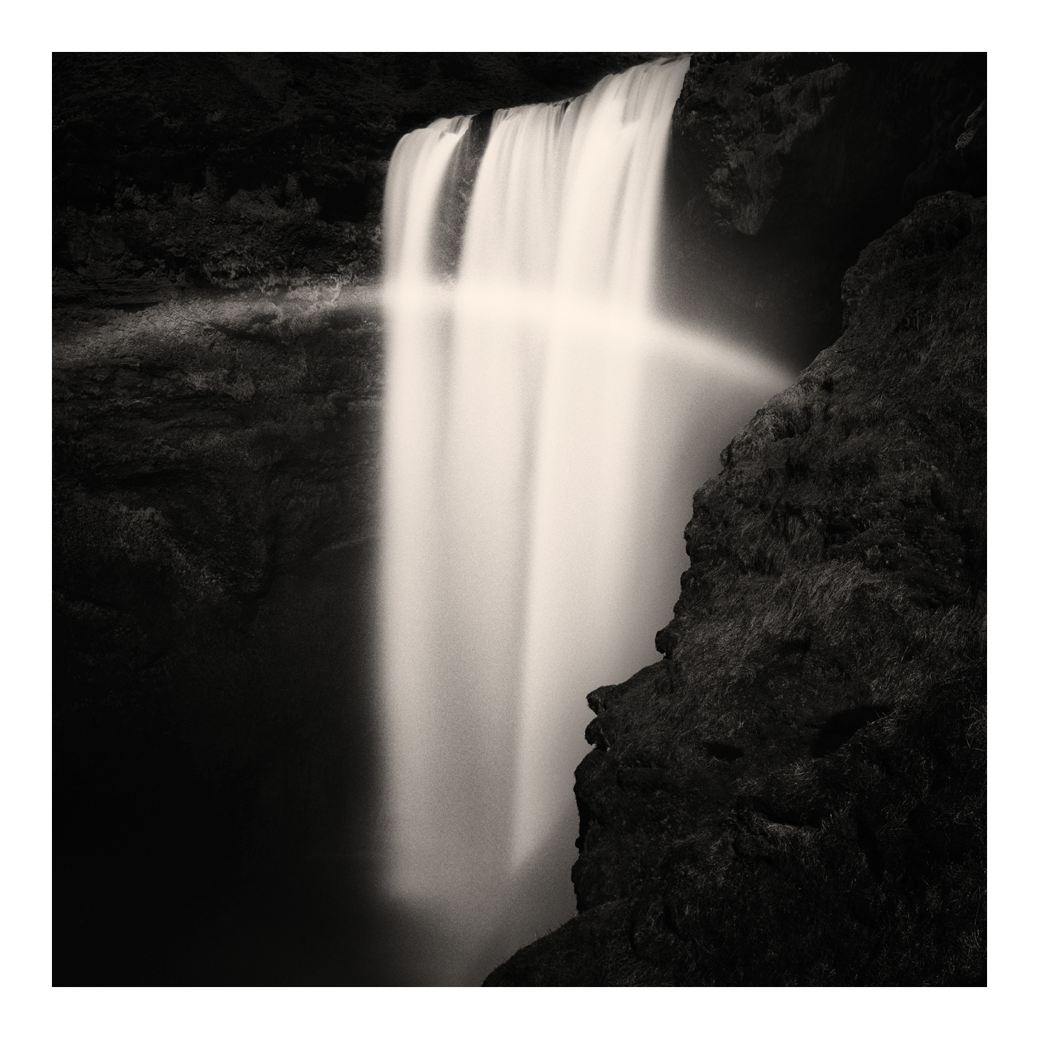 Black and white photograph of the Skógafoss waterfall Iceland