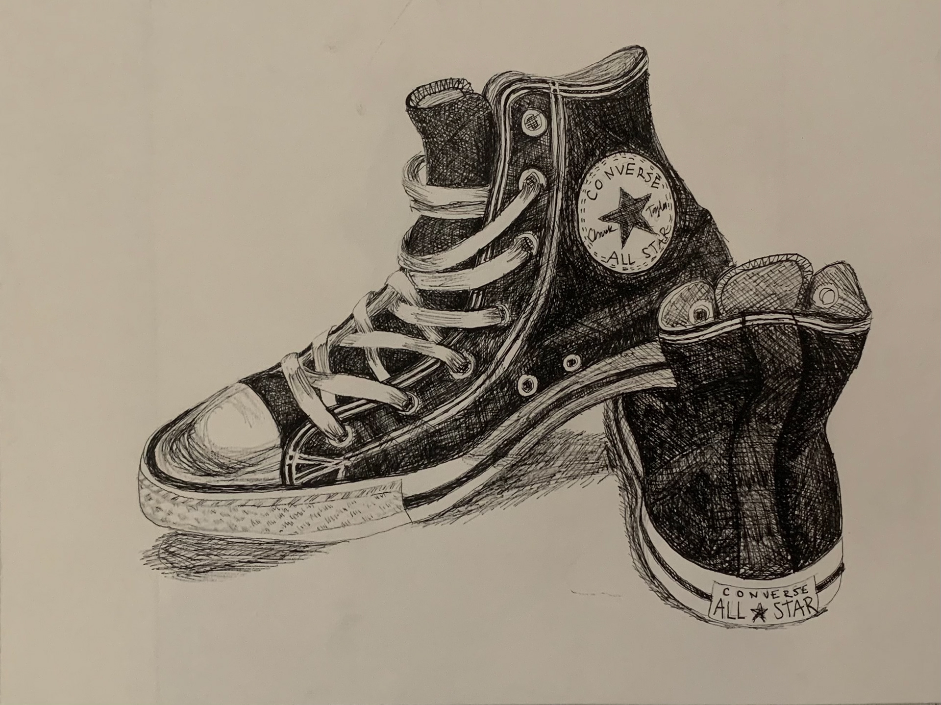 An expressive cross-hatch ink drawing of the pair of Converse I wear every day