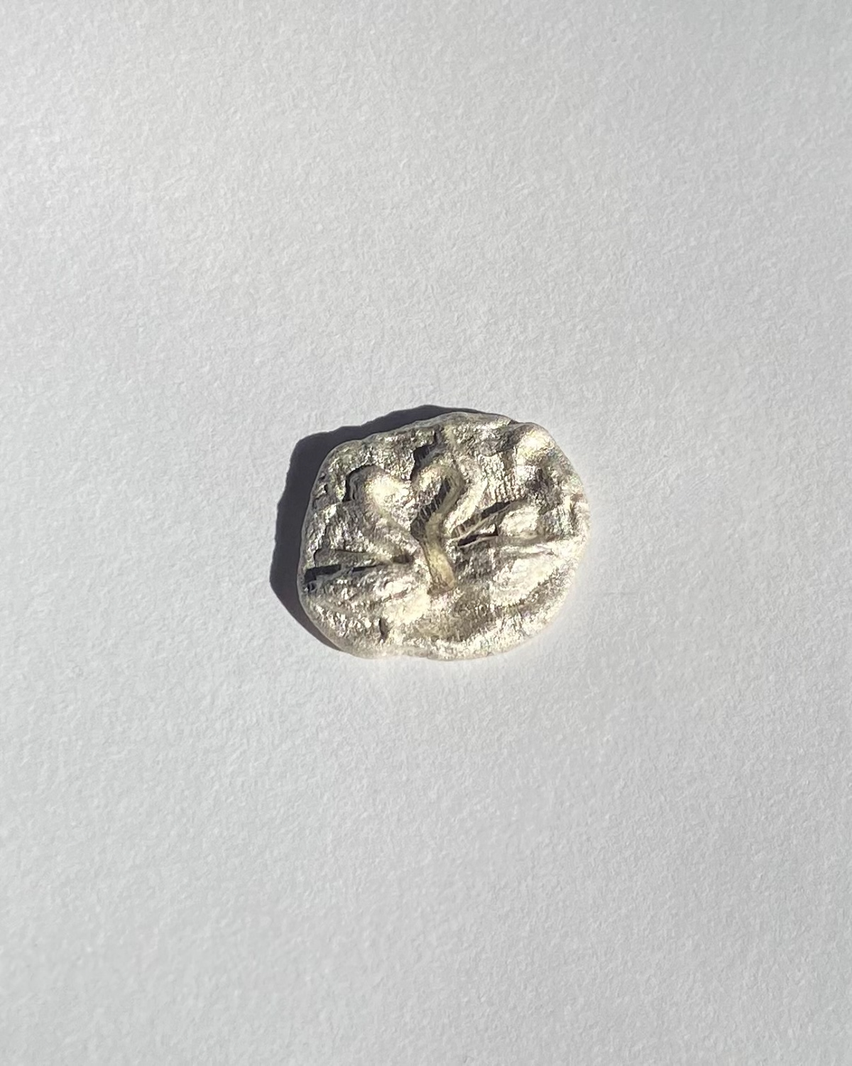 Cast Swans, 2024. Sterling silver.