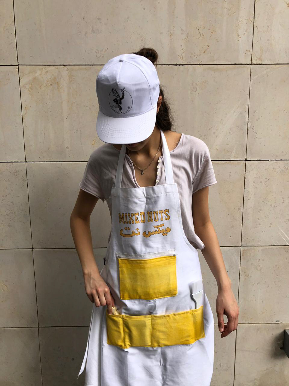the employee's cap and apron