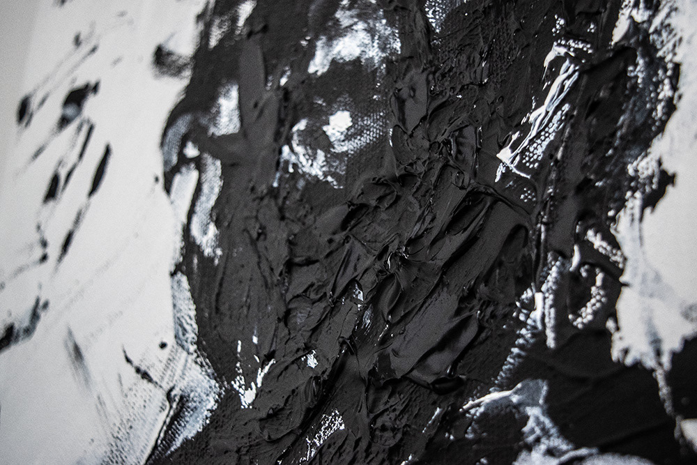 A dark hand engulfs a shirtless male figure in a black and white semi-abstract painting