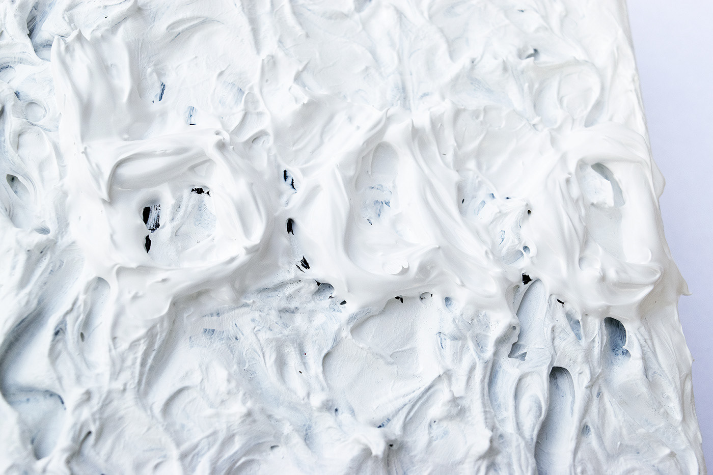 Heavily textured all white abstract painting of the word baa